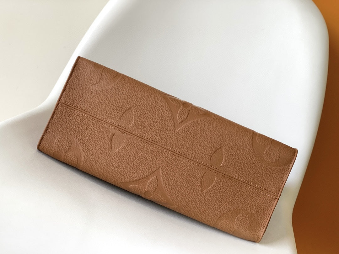 Louis Vuitton OnTheGo GM Monogram Empreinte Leather Tote - Cognac