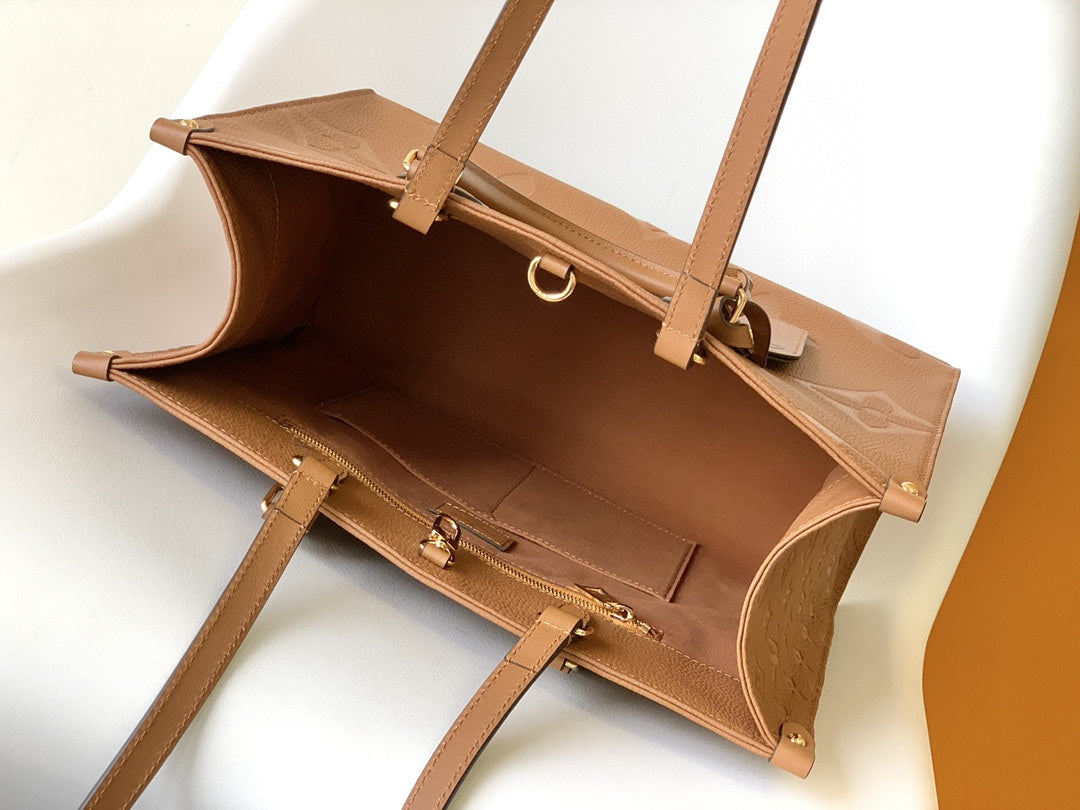 Louis Vuitton OnTheGo GM Monogram Empreinte Leather Tote - Cognac
