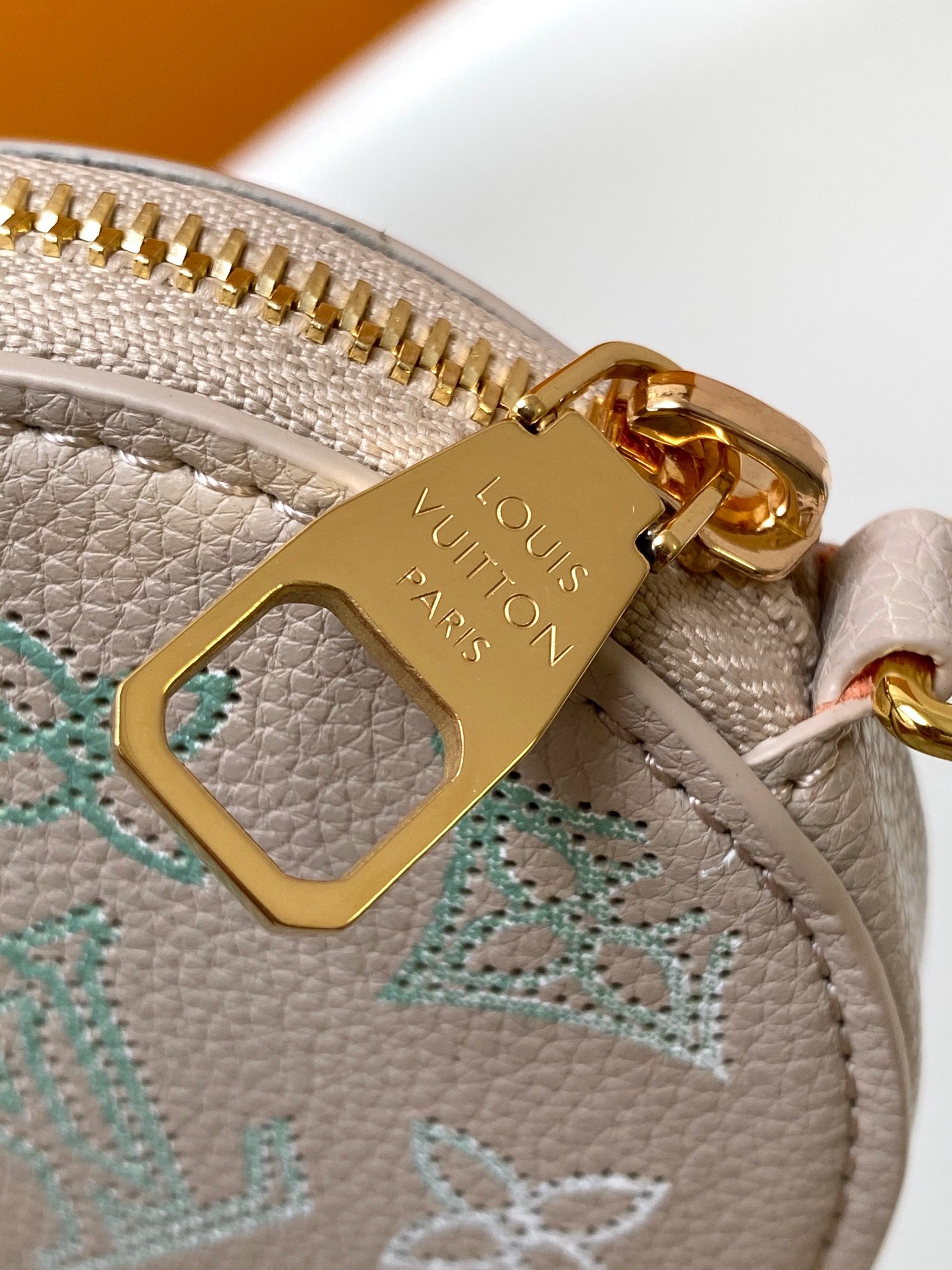 Louis Vuitton Bella Mahina Perforated Leather Bucket Bag - Iridescent Silver/Blue