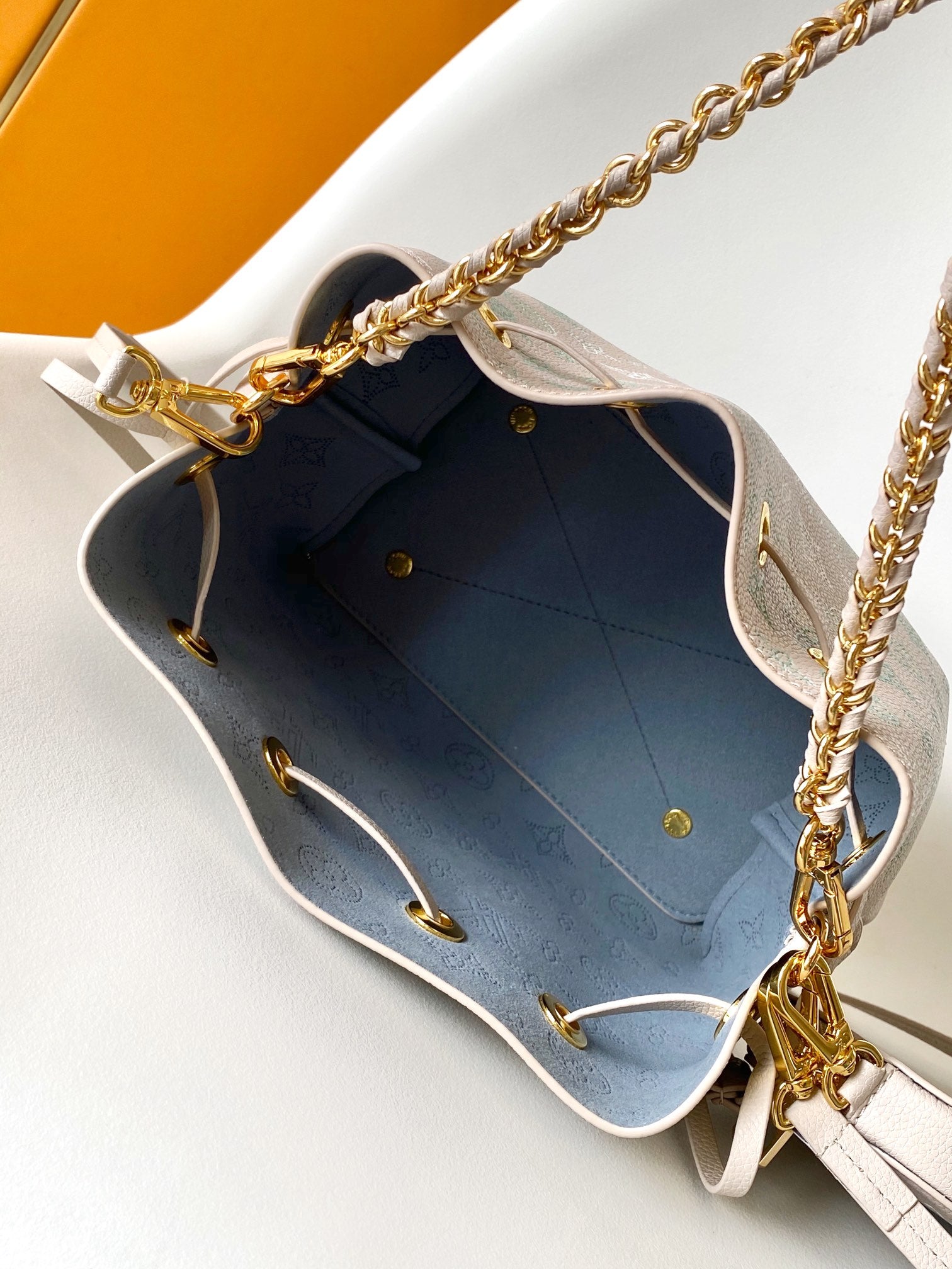 Louis Vuitton Bella Mahina Perforated Leather Bucket Bag - Iridescent Silver/Blue