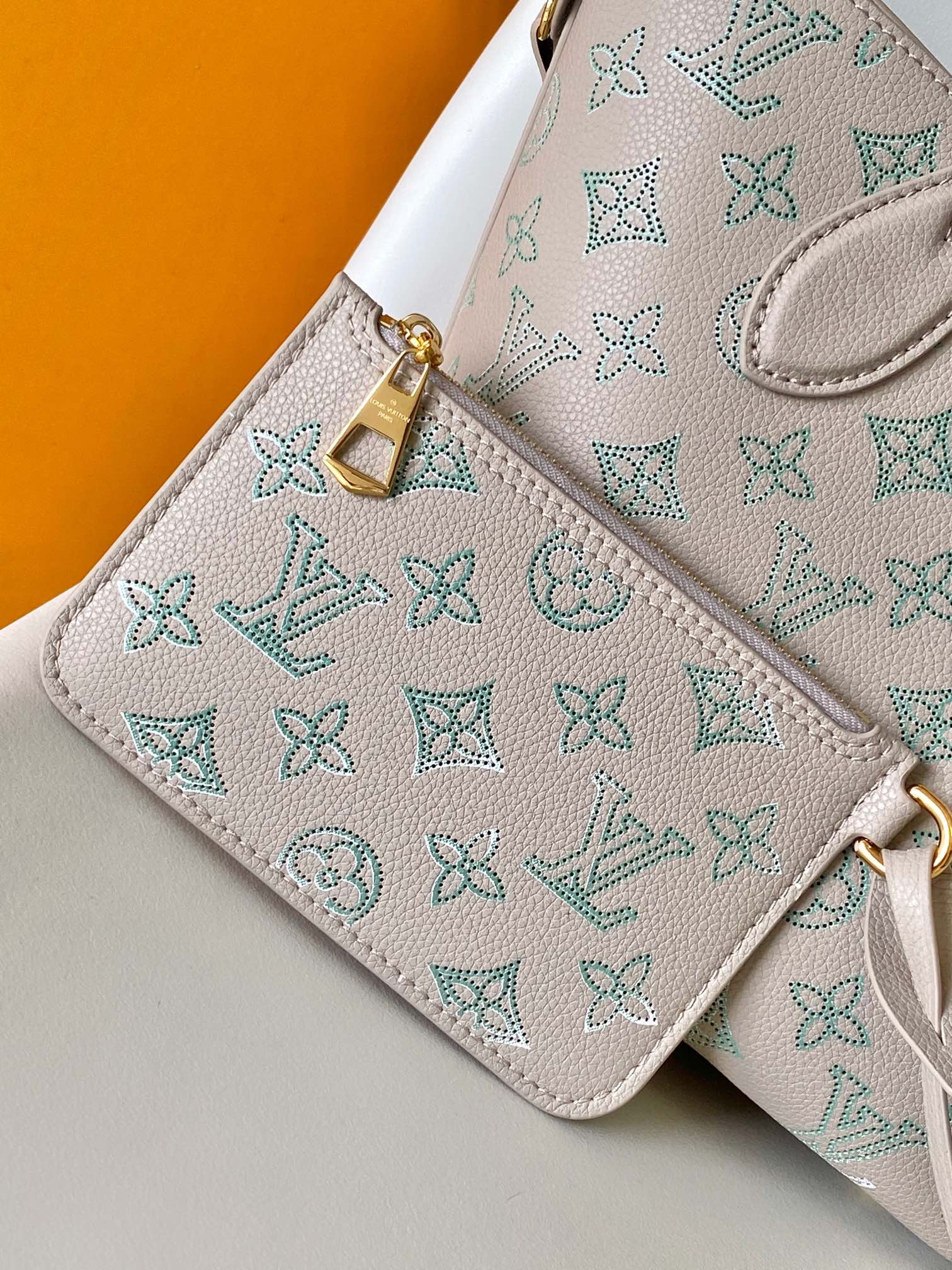 Louis Vuitton Muria Mahina Perforated Leather Bucket Bag - Misty Grey/Blue