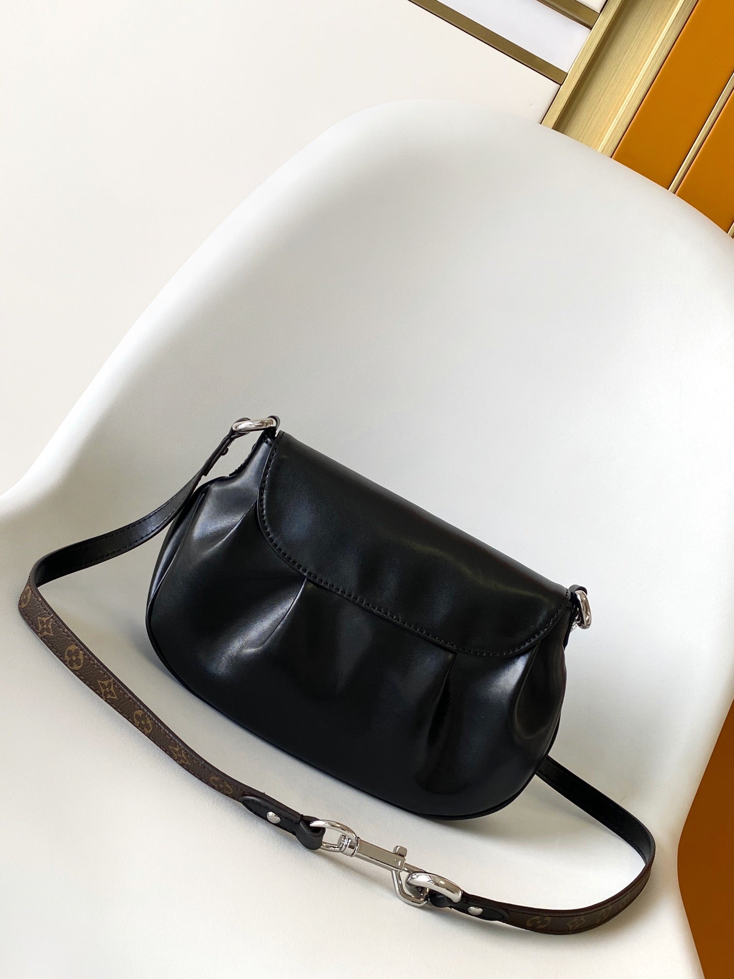 Louis Vuitton Black Leather Shoulder Bag with Monogram Buckle Detail