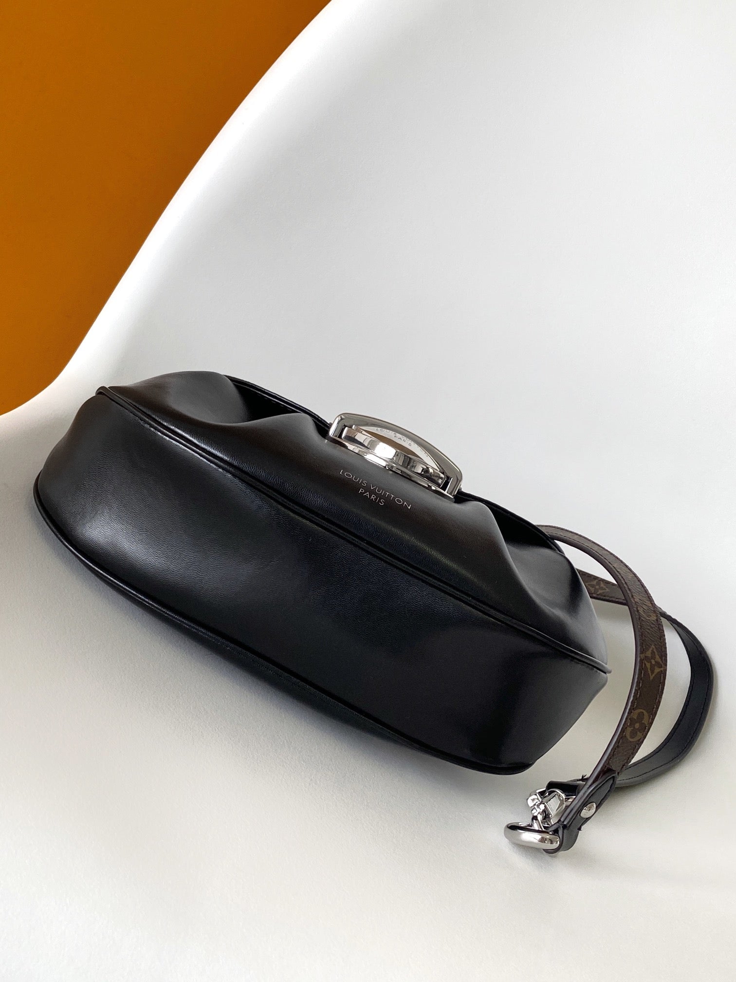 Louis Vuitton Black Leather Shoulder Bag with Monogram Buckle Detail