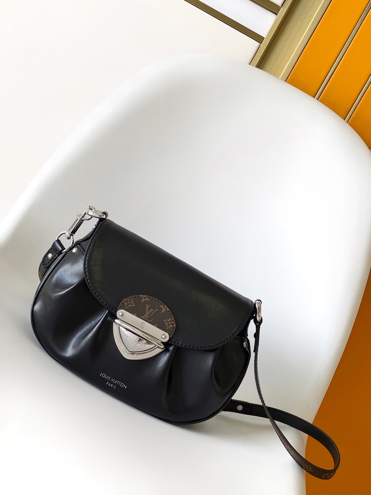 Louis Vuitton Black Leather Shoulder Bag with Monogram Buckle Detail