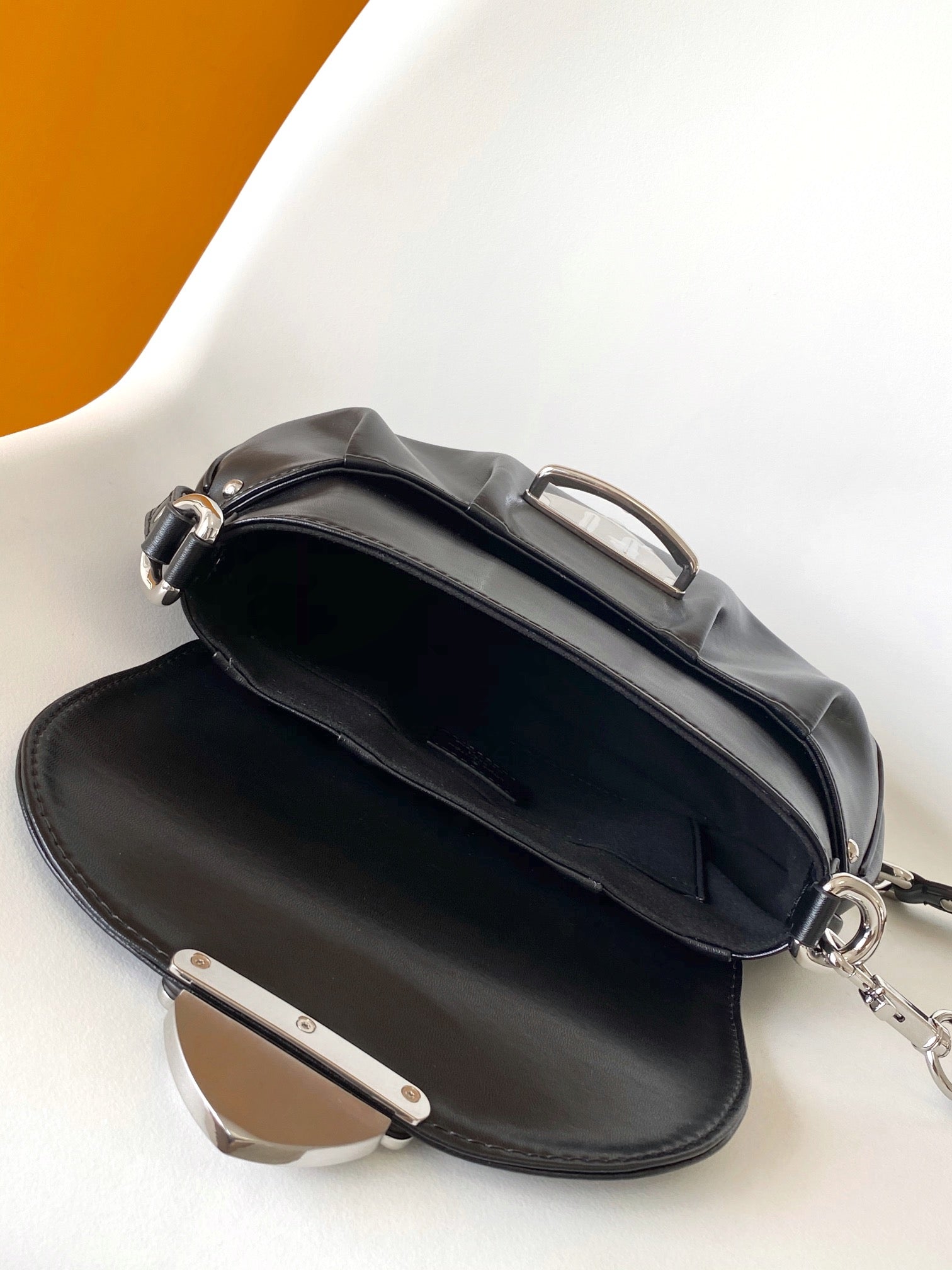 Louis Vuitton Black Leather Shoulder Bag with Monogram Buckle Detail