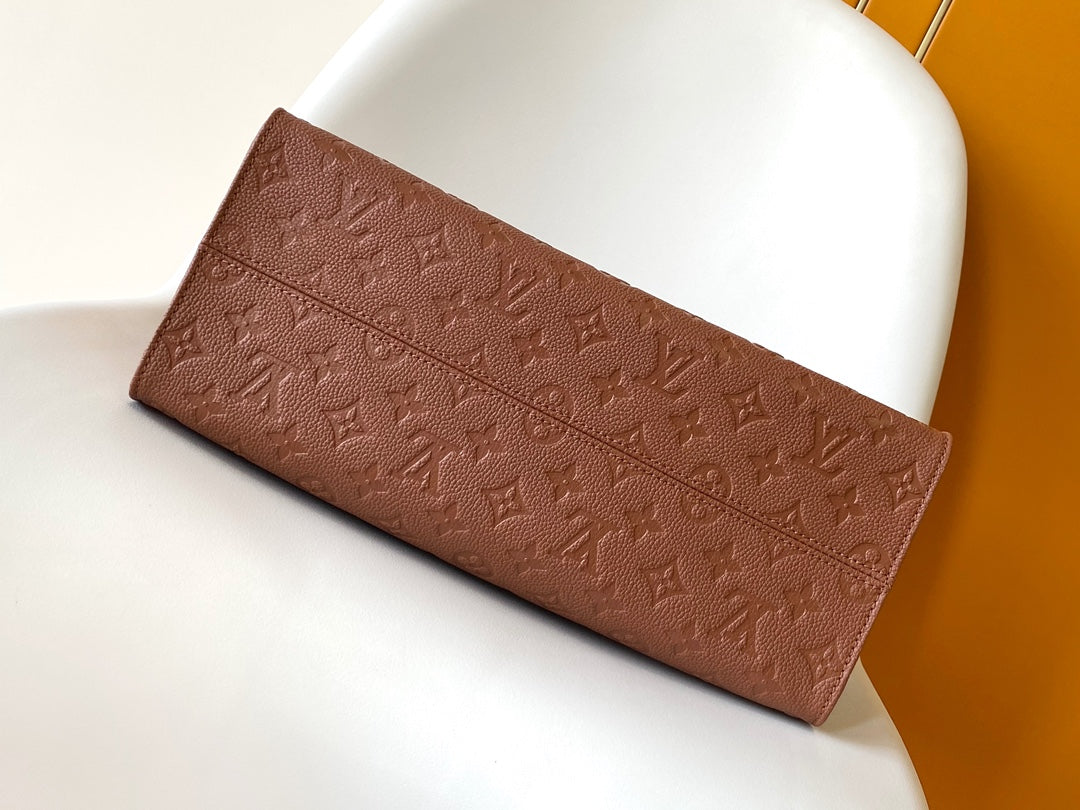 Louis Vuitton OnTheGo MM Monogram Empreinte Leather Tote Bag - Cognac Brown