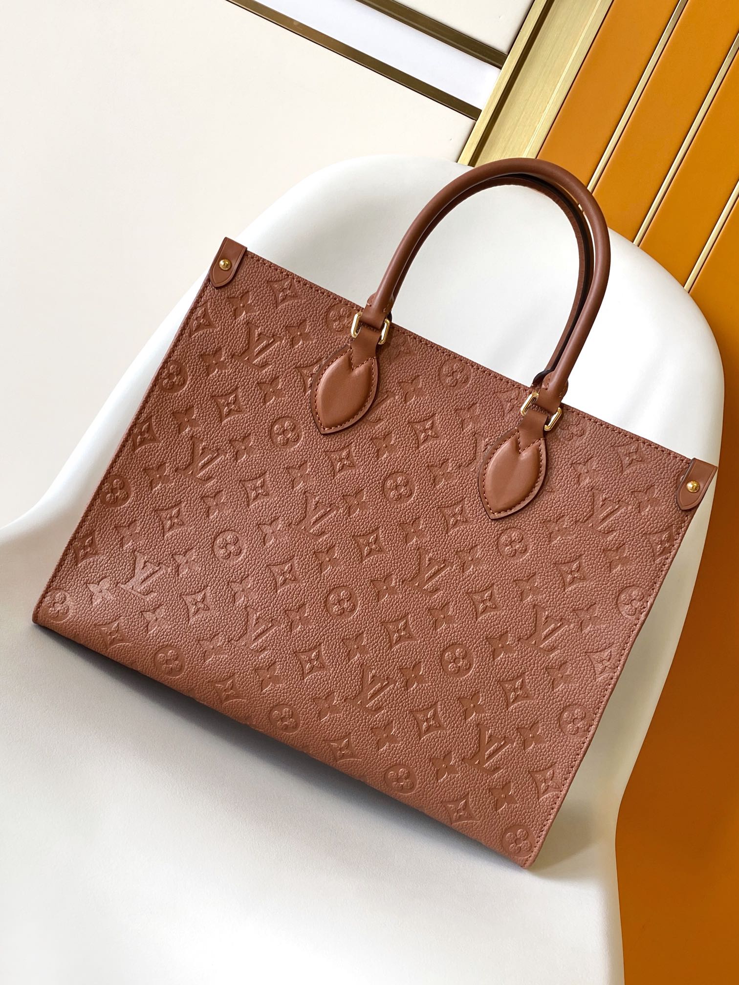 Louis Vuitton OnTheGo MM Monogram Empreinte Leather Tote Bag - Cognac Brown