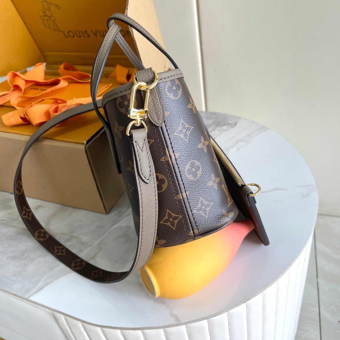 Louis Vuitton Taupe Leather Bucket Handbag with Top Handles and Shoulder Strap