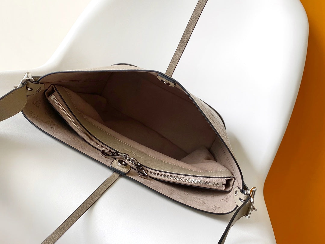 Louis Vuitton Bella Bucket Bag Monogram Mahina Calf Leather - Galet
