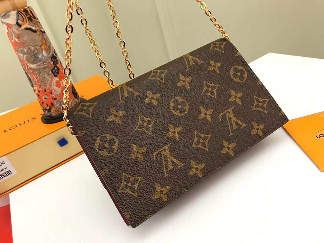 Louis Vuitton Pallas Clutch Monogram Canvas and Pivoine Pink Leather