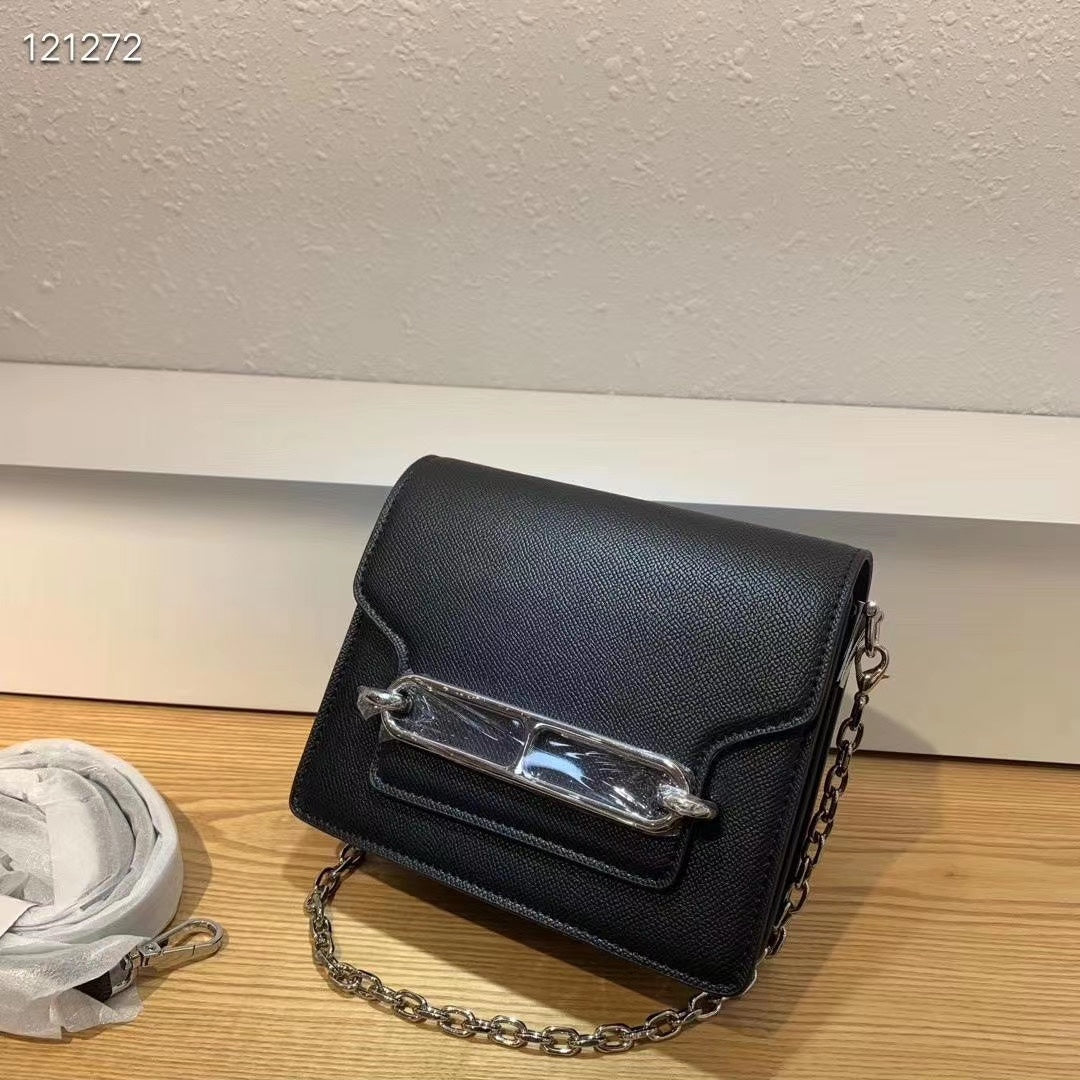 Elegant Black Shoulder Bag with Silver-Tone Chain Strap and Decorative Front Clasp