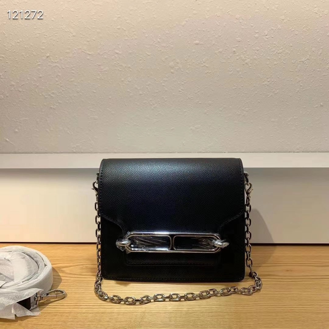 Elegant Black Shoulder Bag with Silver-Tone Chain Strap and Decorative Front Clasp
