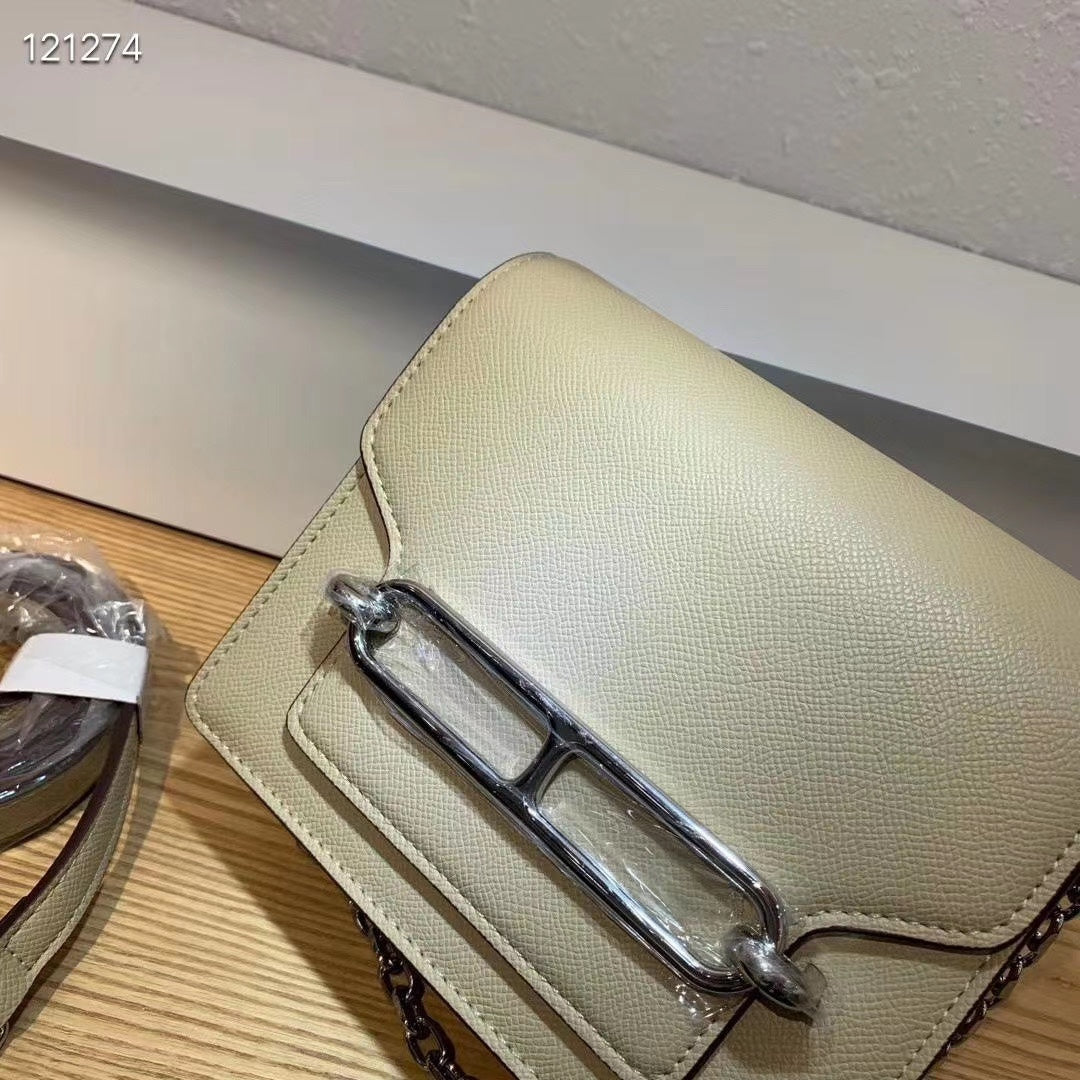 Elegant Gold Leather Crossbody Bag with Chain Strap and Silver Hardware