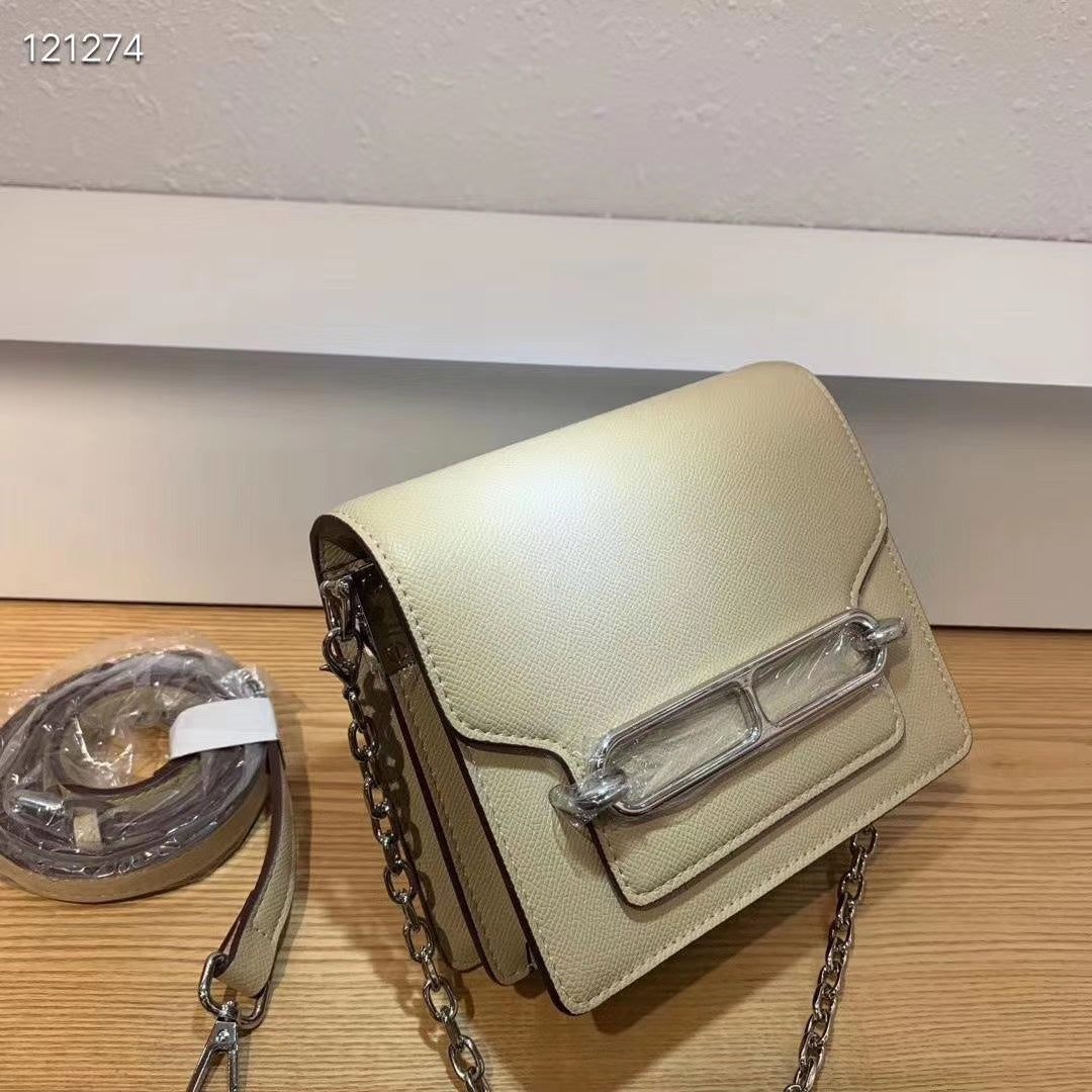 Elegant Gold Leather Crossbody Bag with Chain Strap and Silver Hardware
