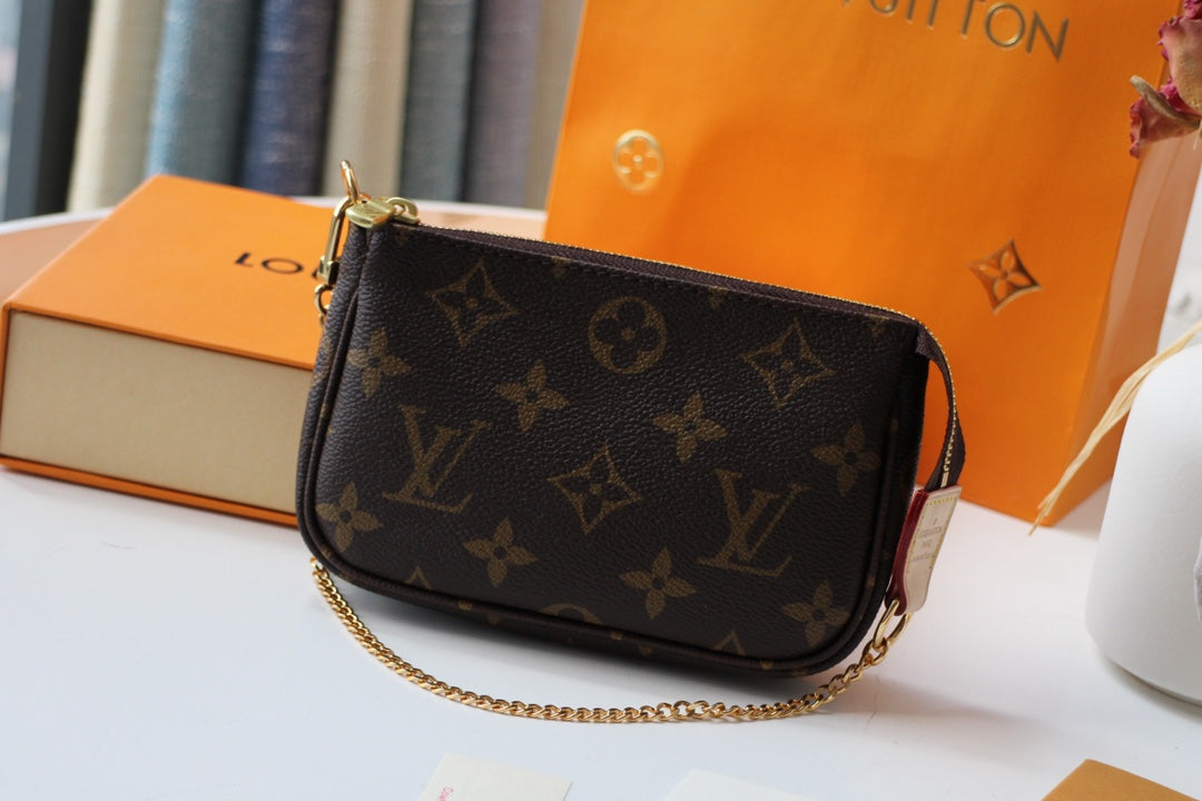 Louis Vuitton Mini Accessoires Pochette Monogram Canvas Brown