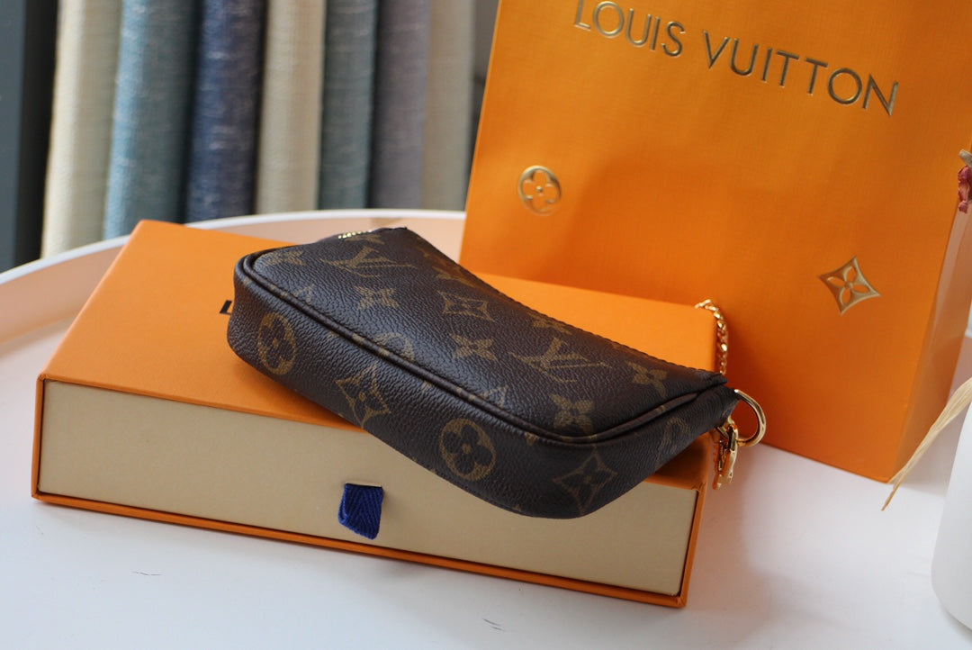 Louis Vuitton Mini Accessoires Pochette Monogram Canvas Brown