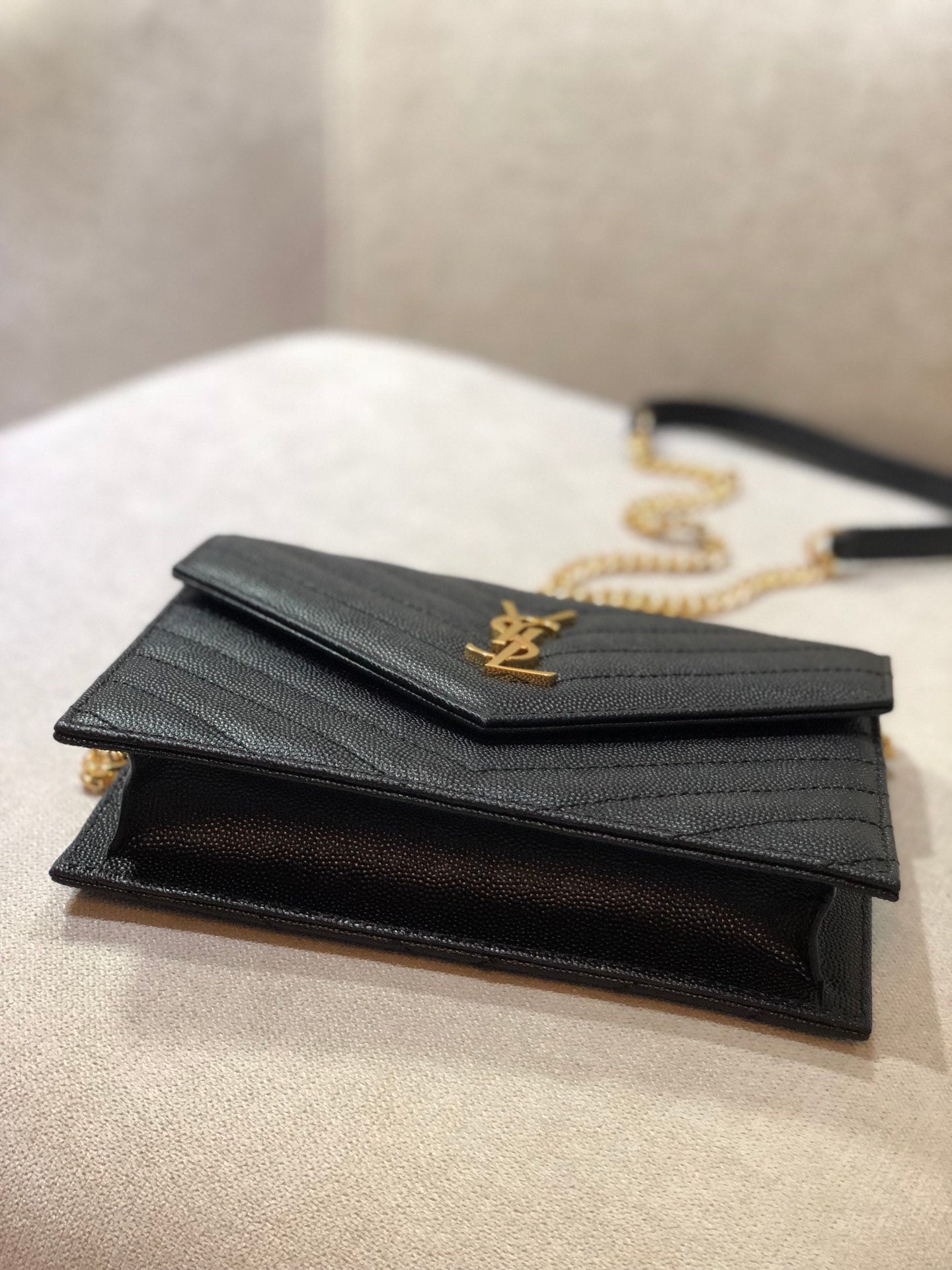 Saint Laurent Cassandre Matelassé Chain Wallet in Grain de Poudre Embossed Leather - Black