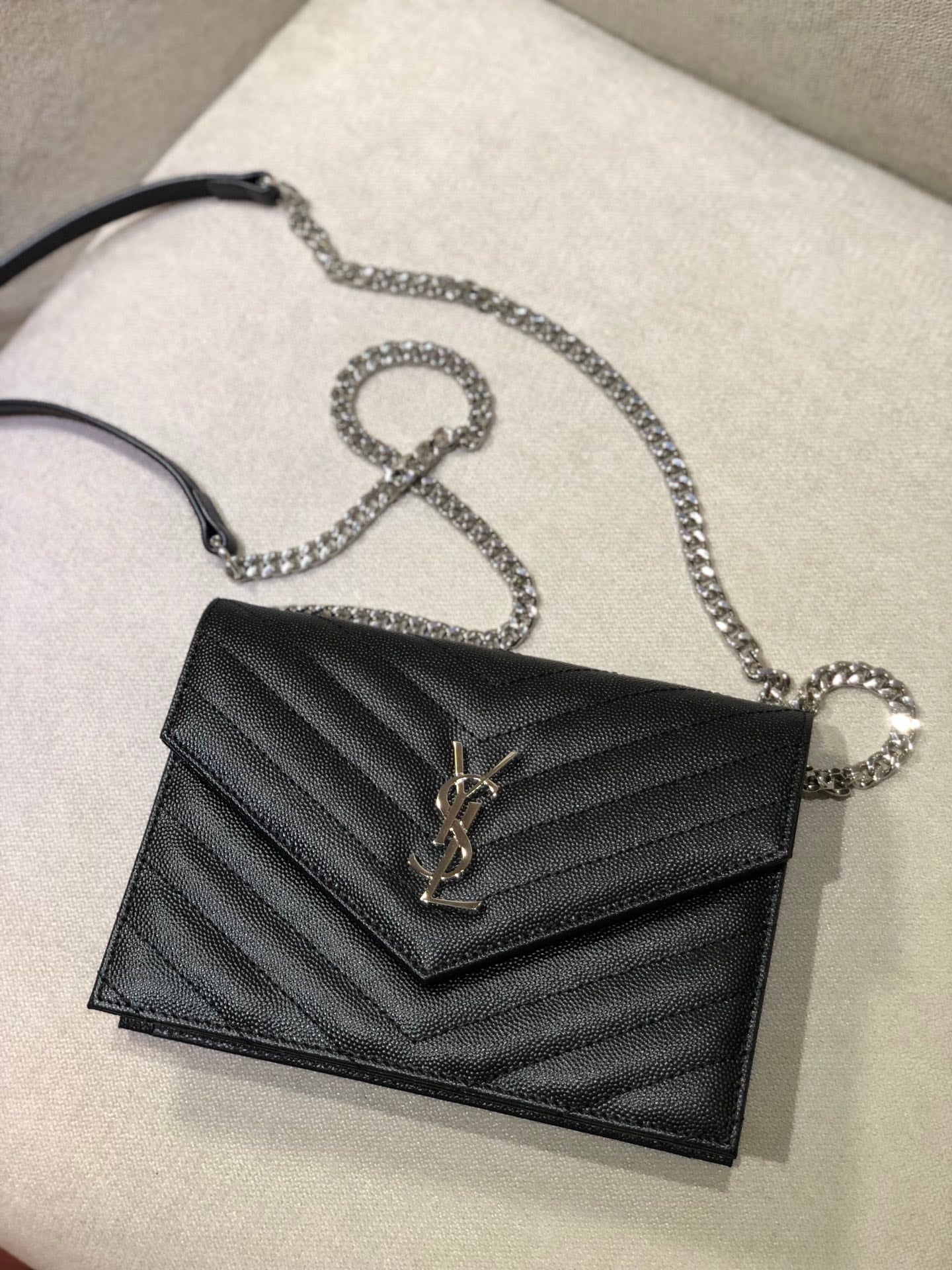 Saint Laurent Cassandre Matelassé Chain Wallet in Black Grain de Poudre Leather