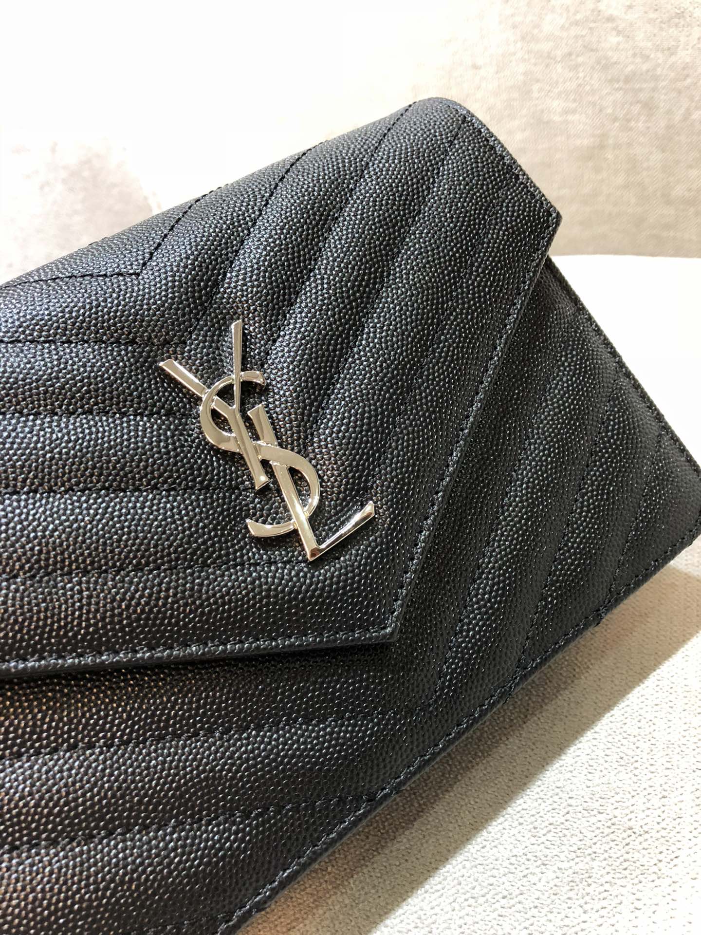 Saint Laurent Cassandre Matelassé Chain Wallet in Black Grain de Poudre Leather