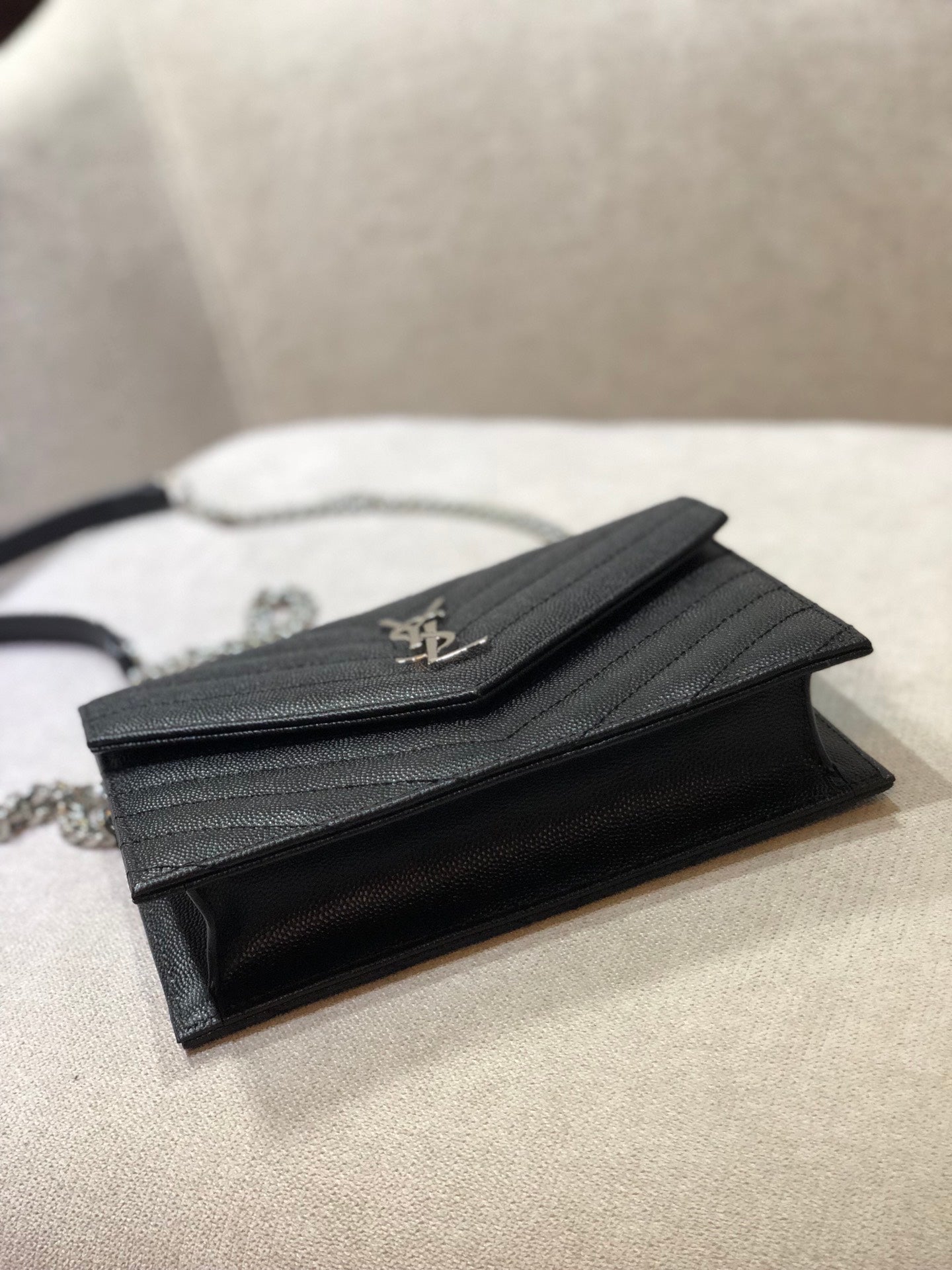 Saint Laurent Cassandre Matelassé Chain Wallet in Black Grain de Poudre Leather