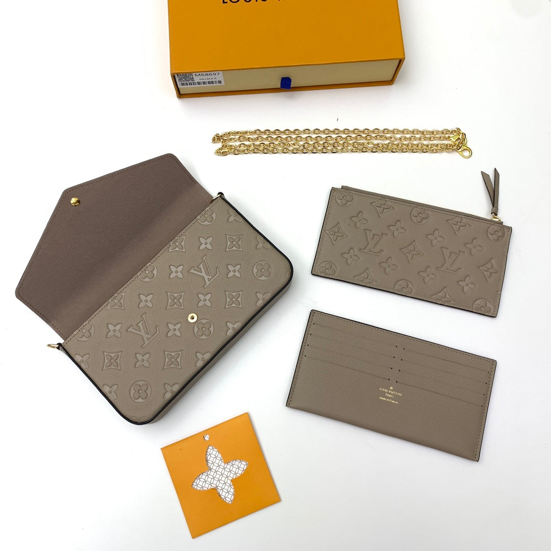 Louis Vuitton Félicie Pochette Monogram Empreinte Leather - Turtledove