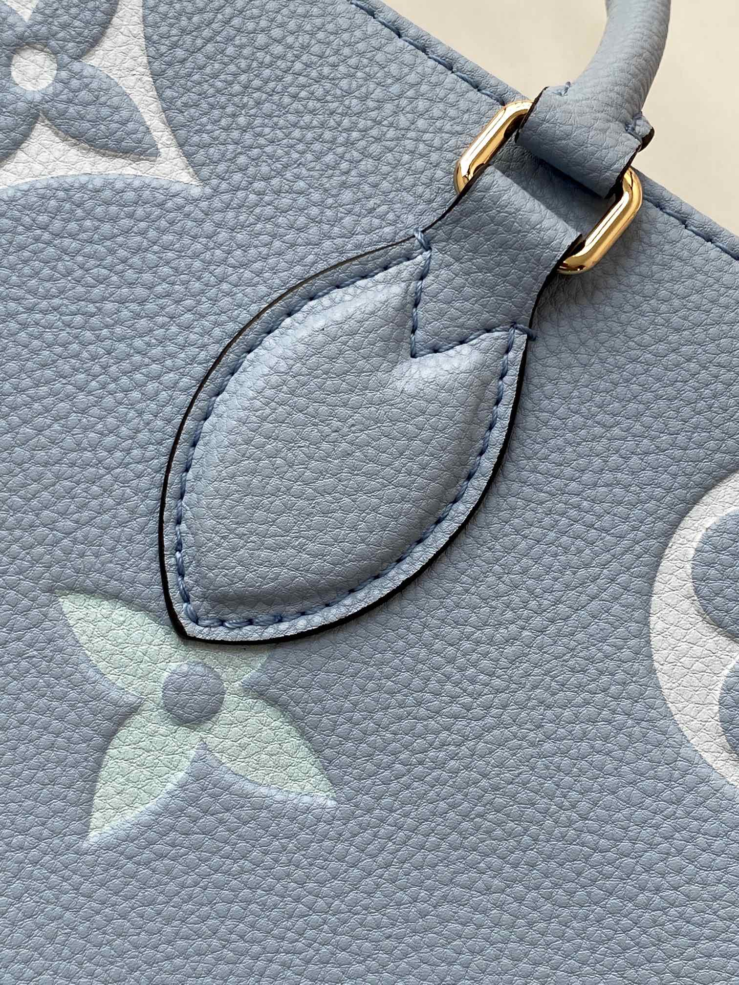 Louis Vuitton OnTheGo MM Monogram Empreinte Leather Tote Bag - Light Blue