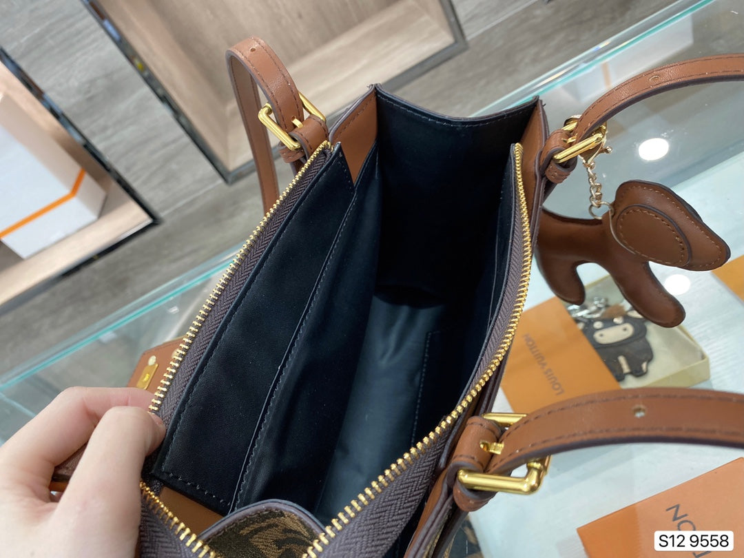 Fendi FF Monogram Canvas Baguette Bag with Leather Trim and Dog Charm
