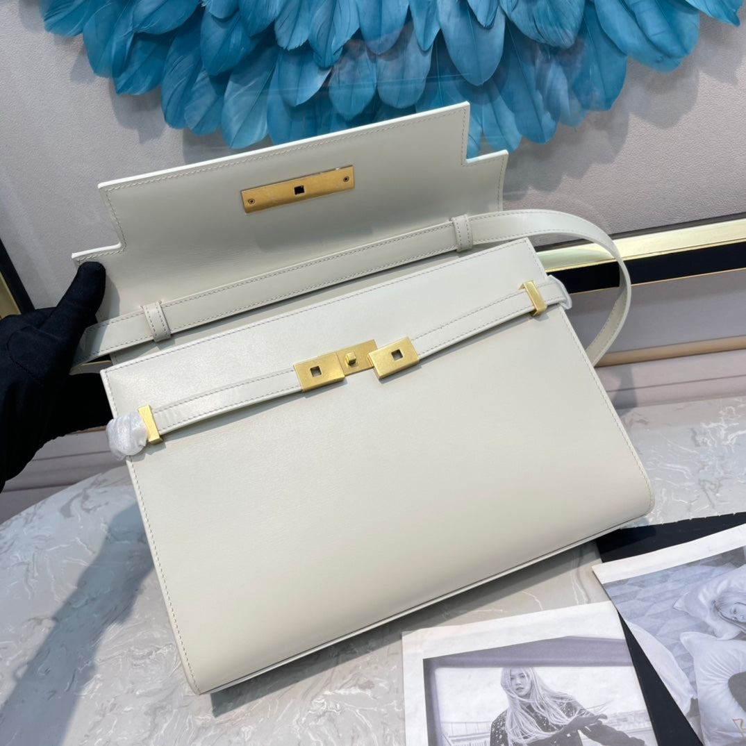 Elegant Women's Cream Leather Shoulder Bag with Gold Hardware and Buckle Detail