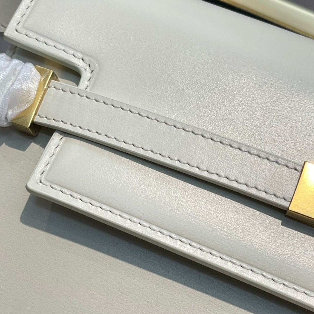 Elegant Women's Cream Leather Shoulder Bag with Gold Hardware and Buckle Detail
