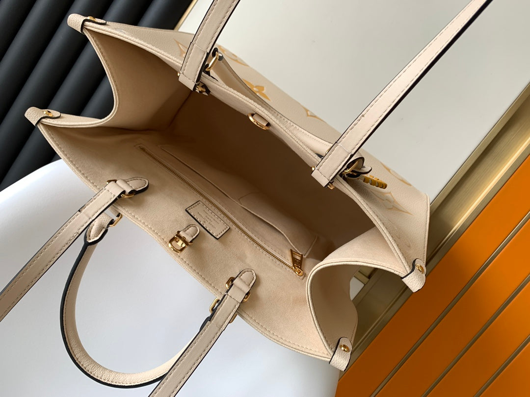 Louis Vuitton OnTheGo MM Monogram Empreinte Leather Tote Bag - Cream/Yellow