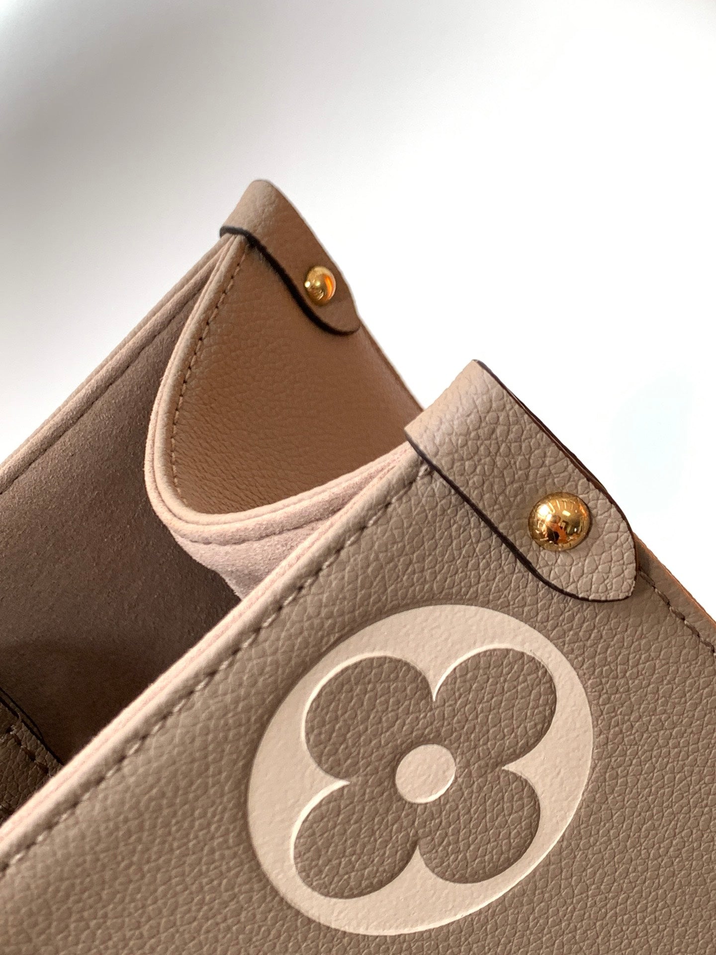 Louis Vuitton Elegant Taupe Leather Tote Bag with Large Embossed Monogram