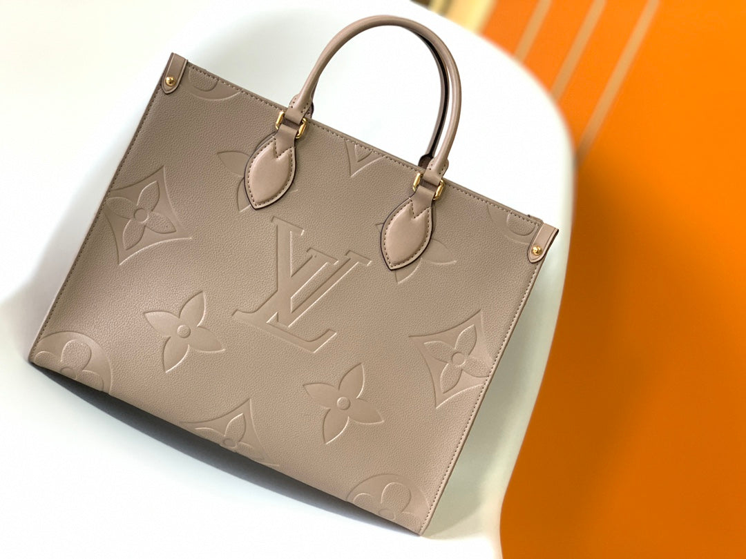 Louis Vuitton Elegant Taupe Embossed Leather Tote Bag with Top Handles