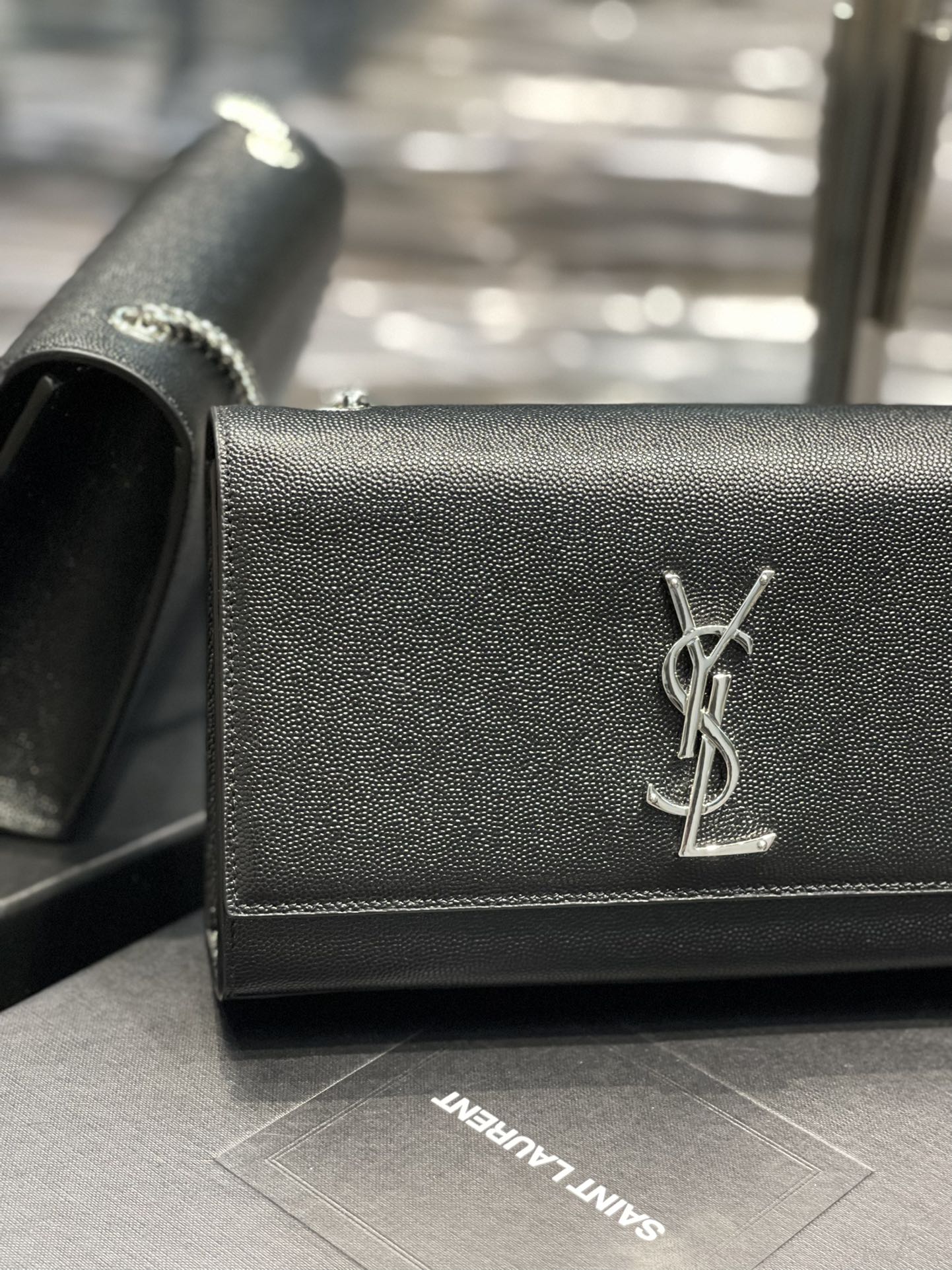 Saint Laurent Sunset Chain Wallet in Grain de Poudre Embossed Leather - Black