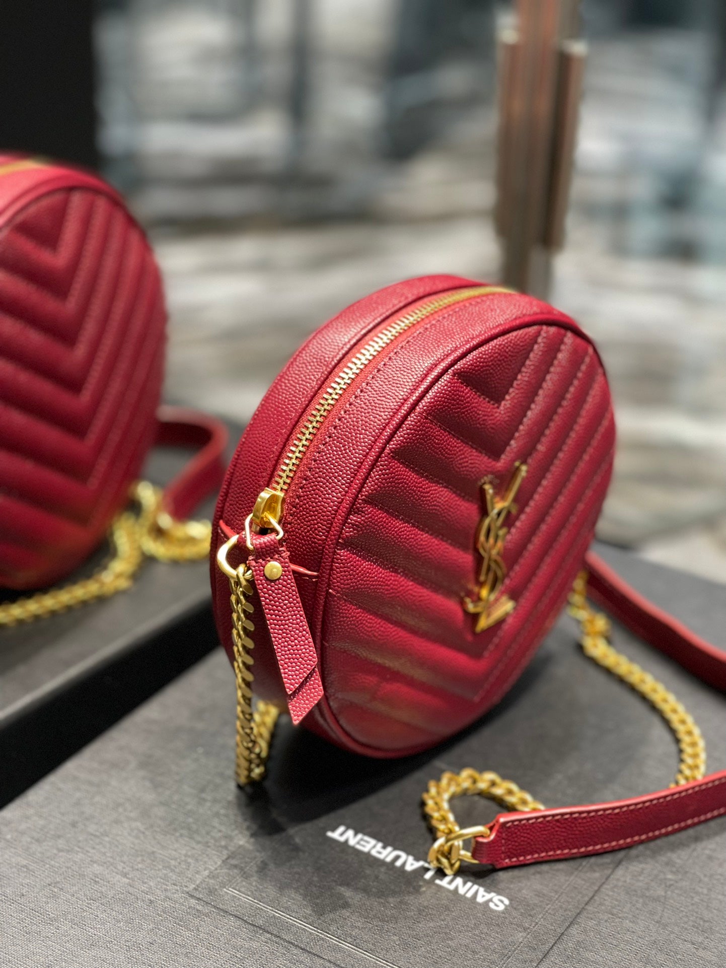 Saint Laurent Vinyle Round Camera Bag in Chevron-Quilted Leather - Red