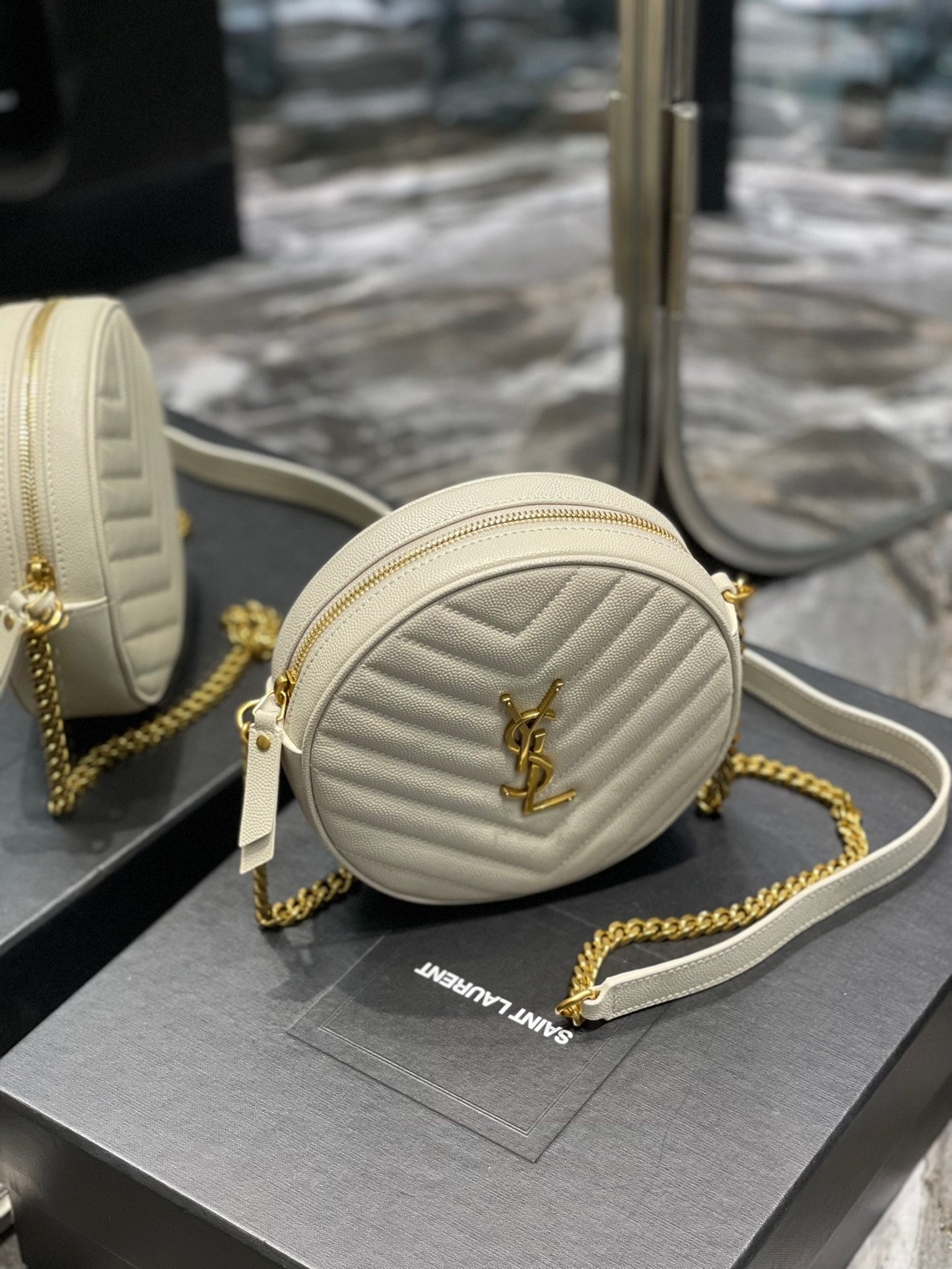 Saint Laurent Vinyle Round Camera Bag in Chevron-Quilted Leather - Off-White