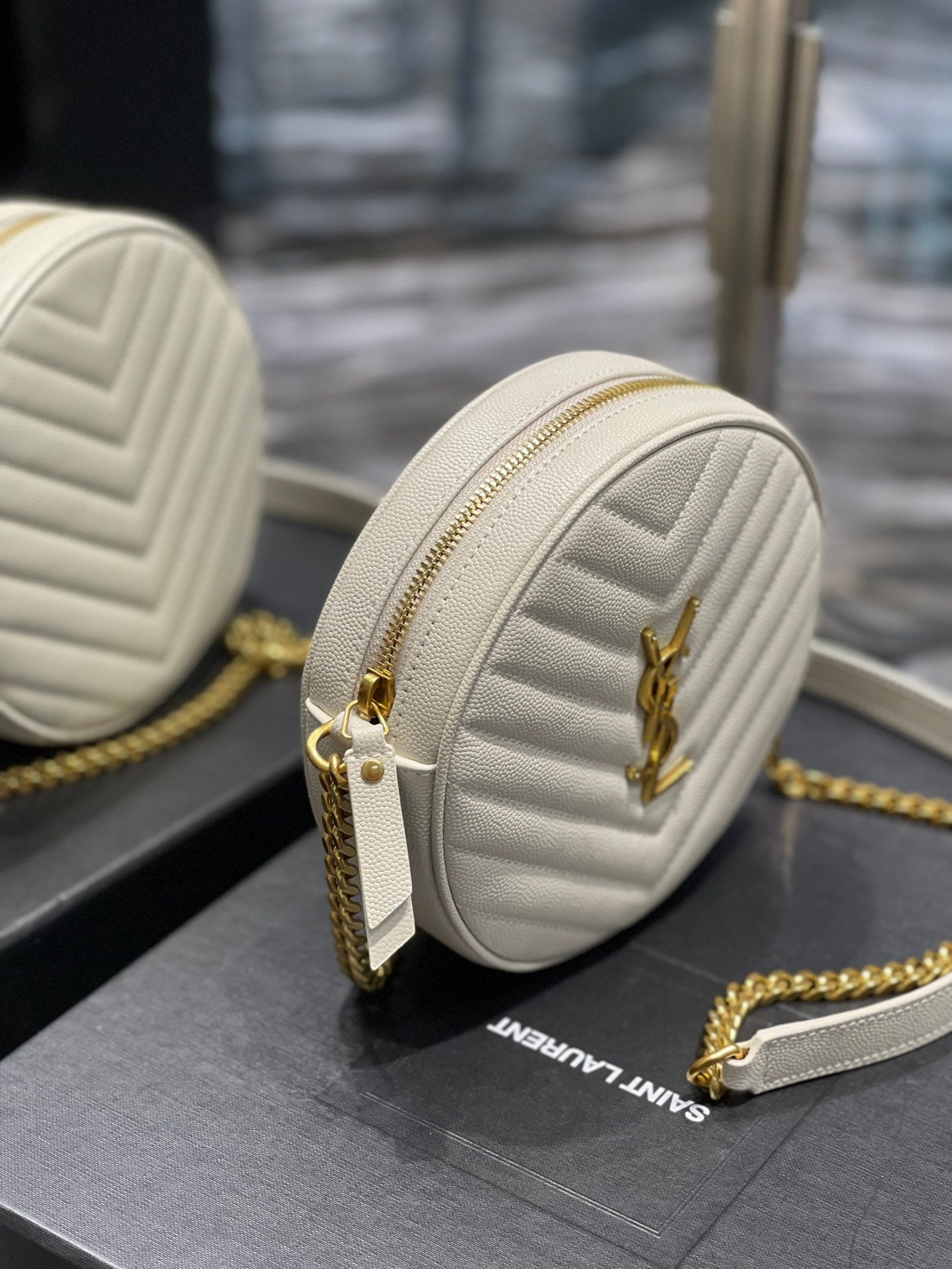 Saint Laurent Vinyle Round Camera Bag in Chevron-Quilted Leather - Off-White