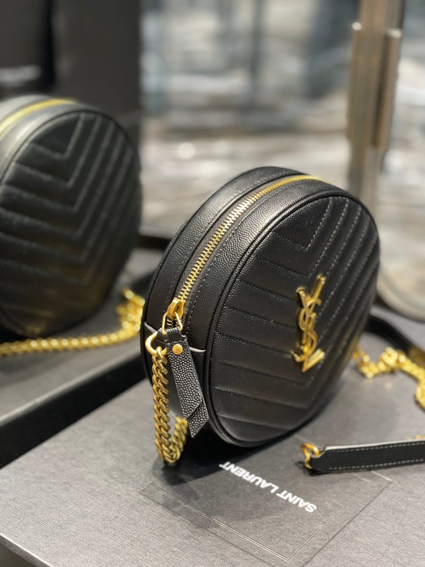 Saint Laurent Vinyle Round Camera Bag in Chevron Quilted Leather - Black
