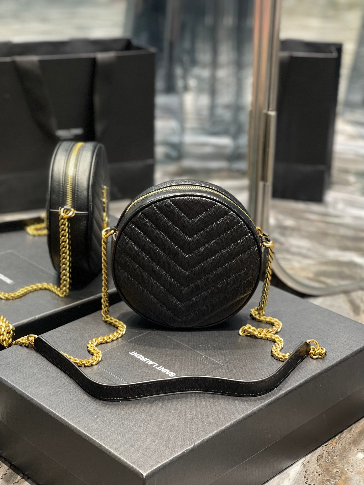 Saint Laurent Vinyle Round Camera Bag in Chevron Quilted Leather - Black