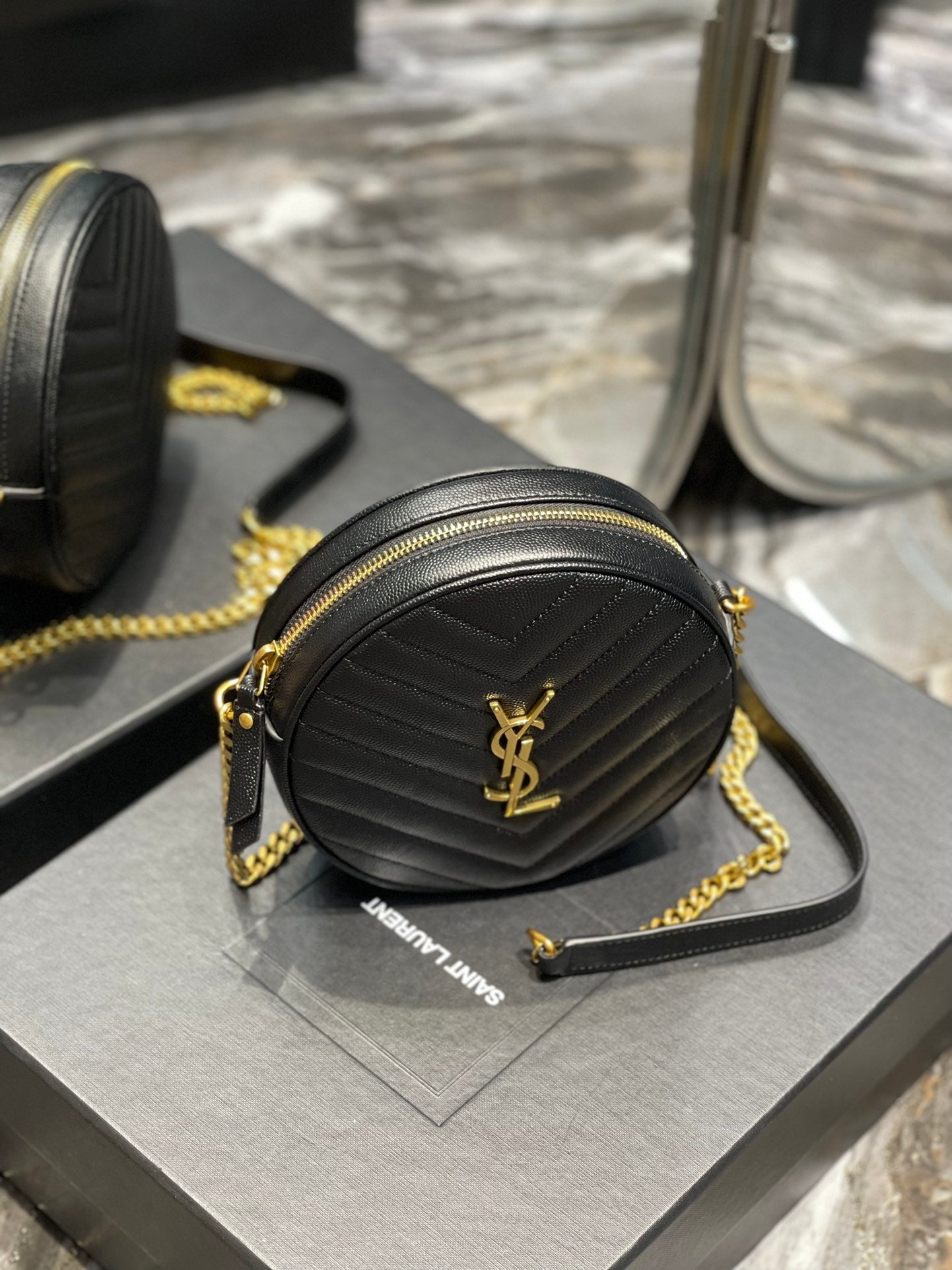 Saint Laurent Vinyle Round Camera Bag in Chevron Quilted Leather - Black