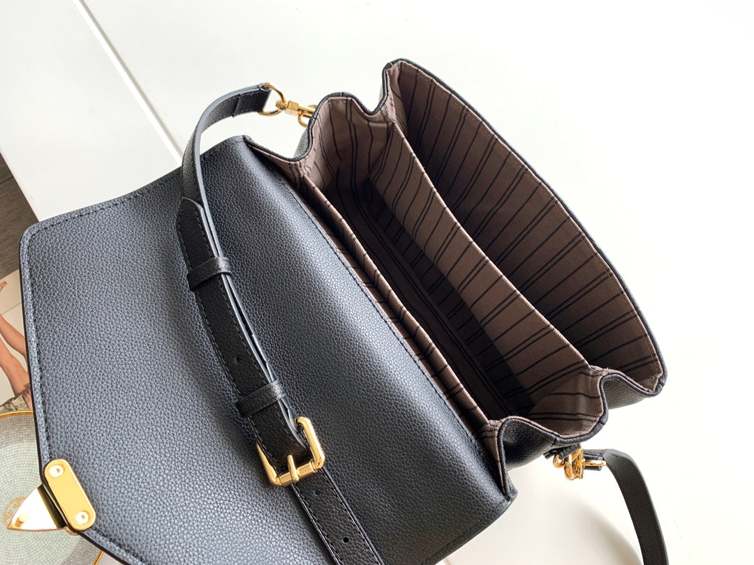Louis Vuitton Pochette Métis Monogram Empreinte Leather Handbag - Black