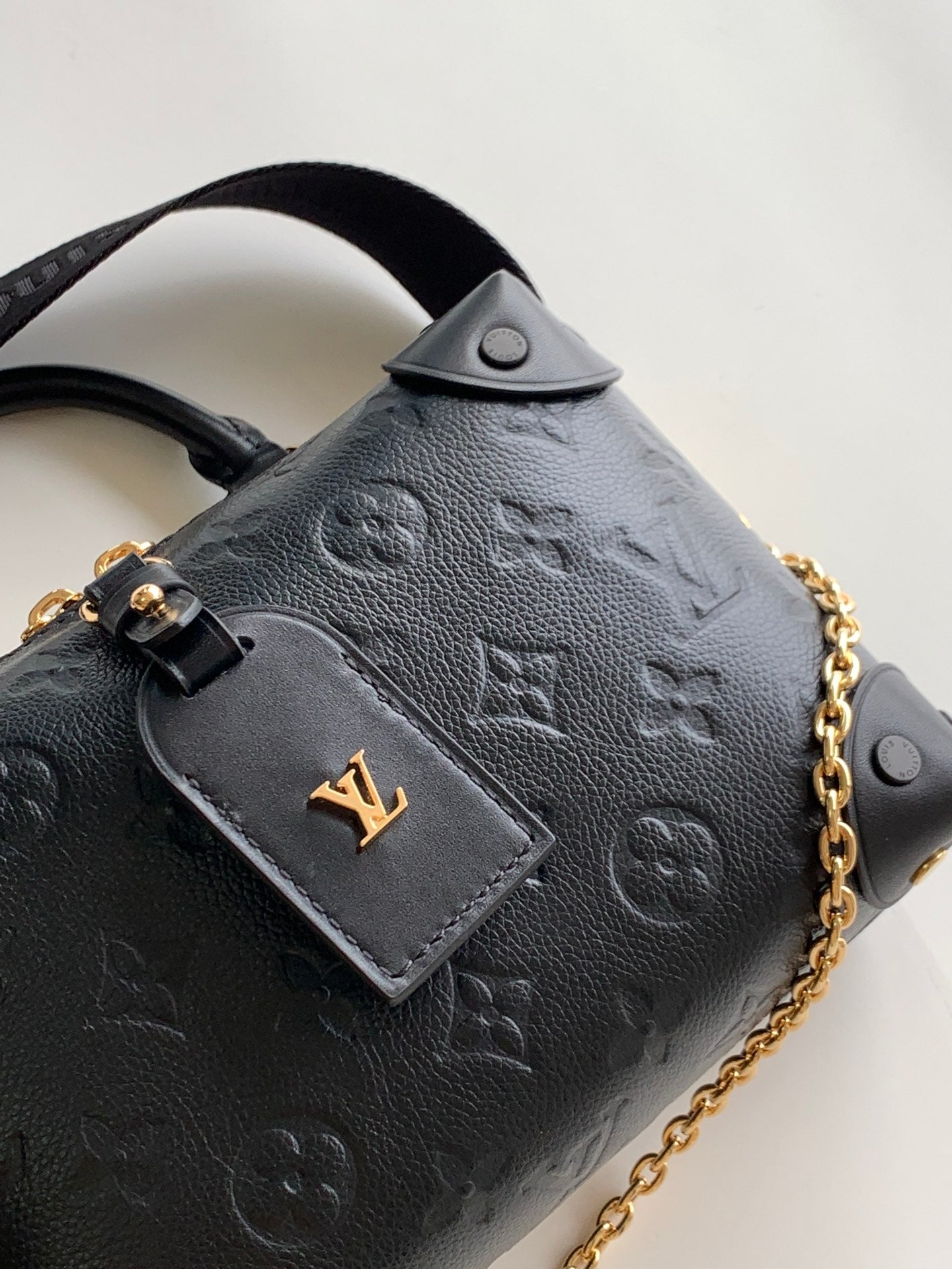 Louis Vuitton Black Embossed Crossbody Handbag with Wide Strap and Gold Chain