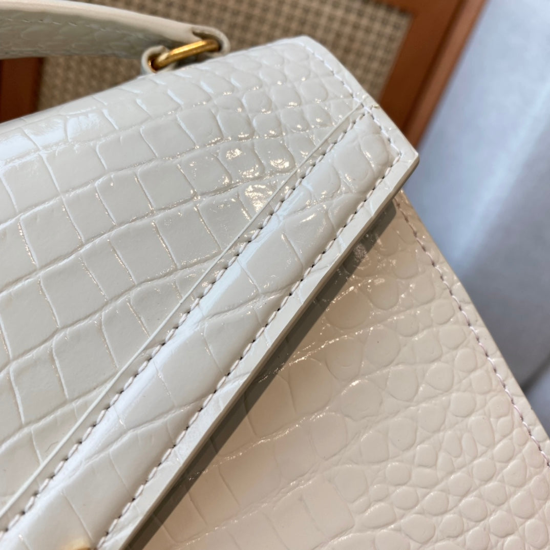 Saint Laurent Cassandra Medium Top Handle Bag in Crocodile-Embossed Leather - White