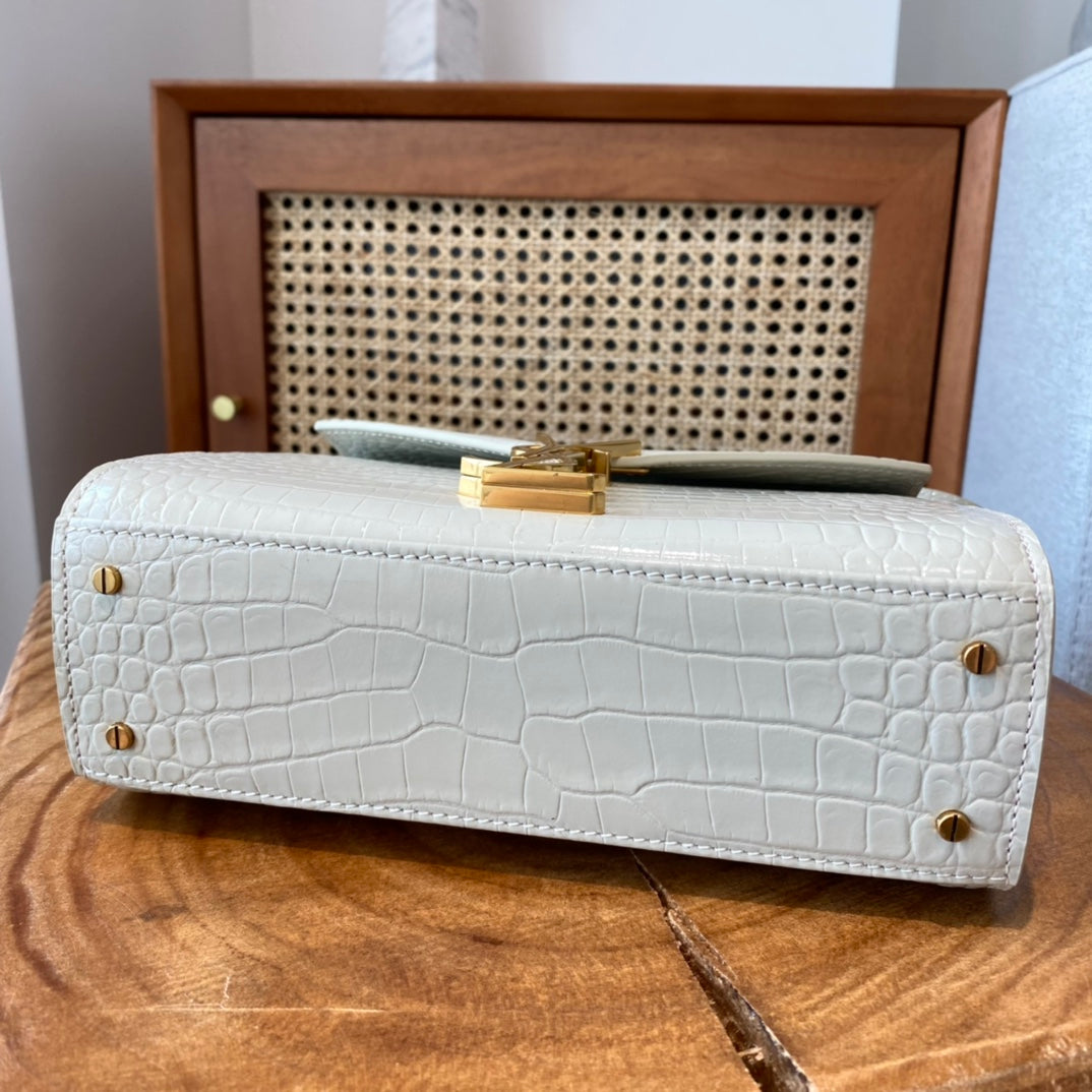 Saint Laurent Cassandra Medium Top Handle Bag in Crocodile-Embossed Leather - White