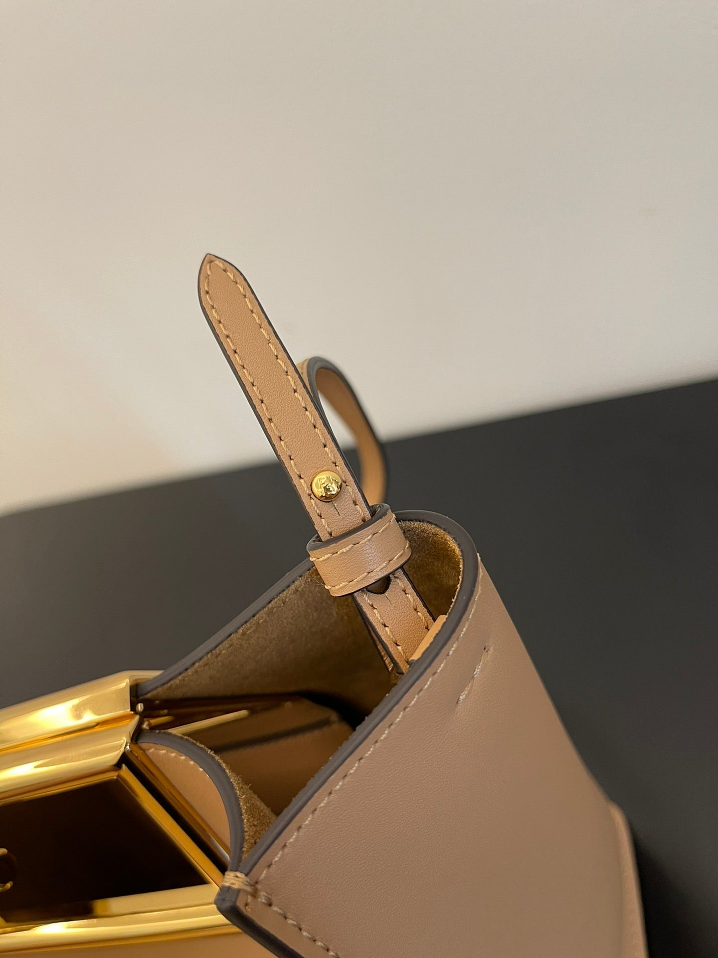 Elegant Beige Leather Handbag with Gold-Tone Cutout Handle - Small Crossbody Bucket Bag