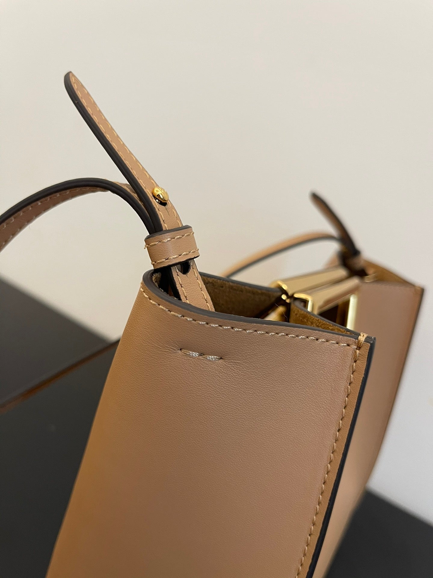 Elegant Beige Leather Handbag with Gold-Tone Cutout Handle - Small Crossbody Bucket Bag