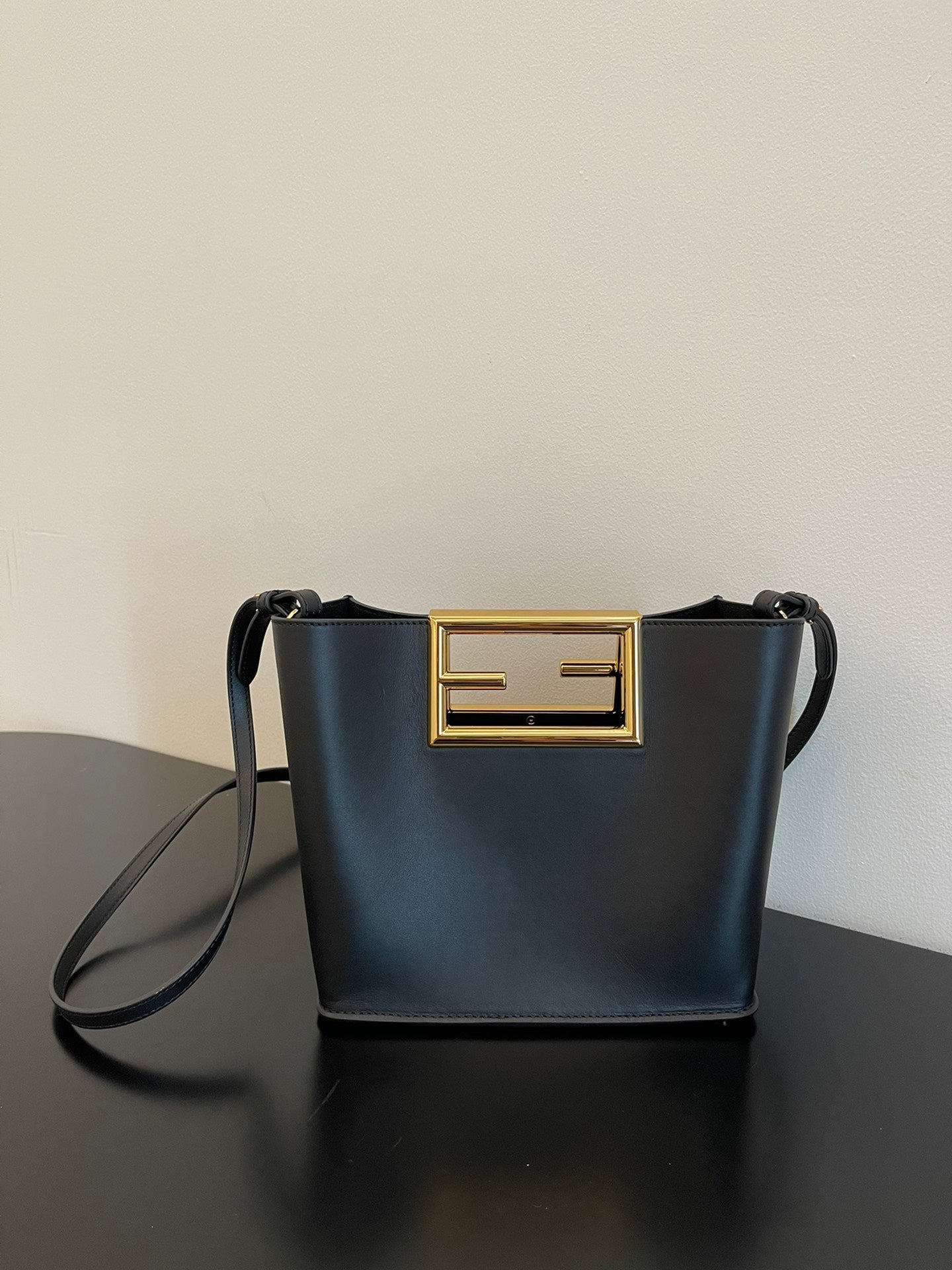 Luxury Black Leather Mini Bucket Shoulder Bag with Gold Metal Logo Buckle
