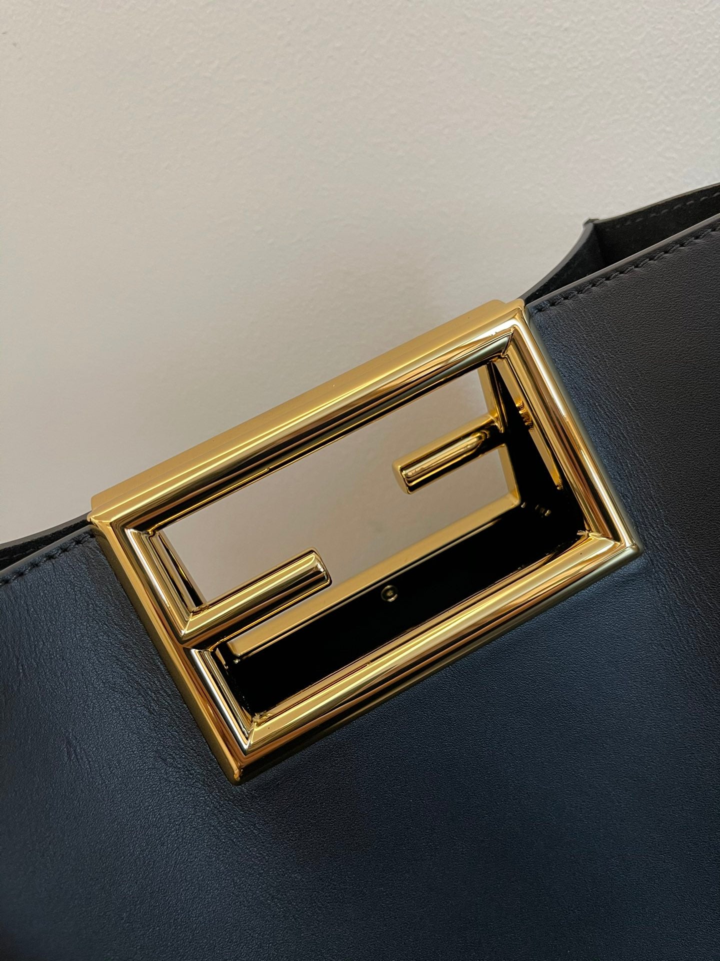 Luxury Black Leather Mini Bucket Shoulder Bag with Gold Metal Logo Buckle