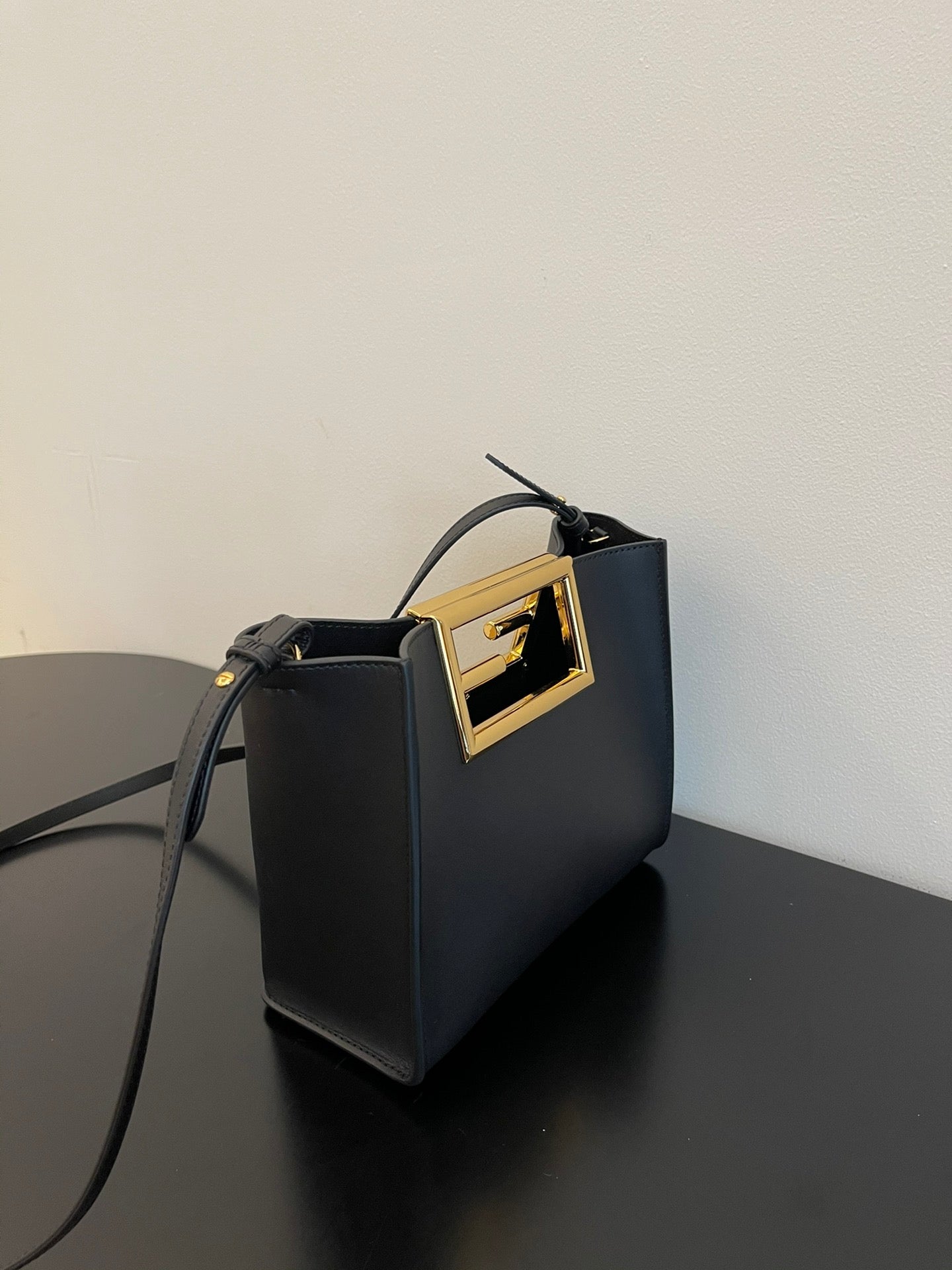 Luxury Black Leather Mini Bucket Shoulder Bag with Gold Metal Logo Buckle