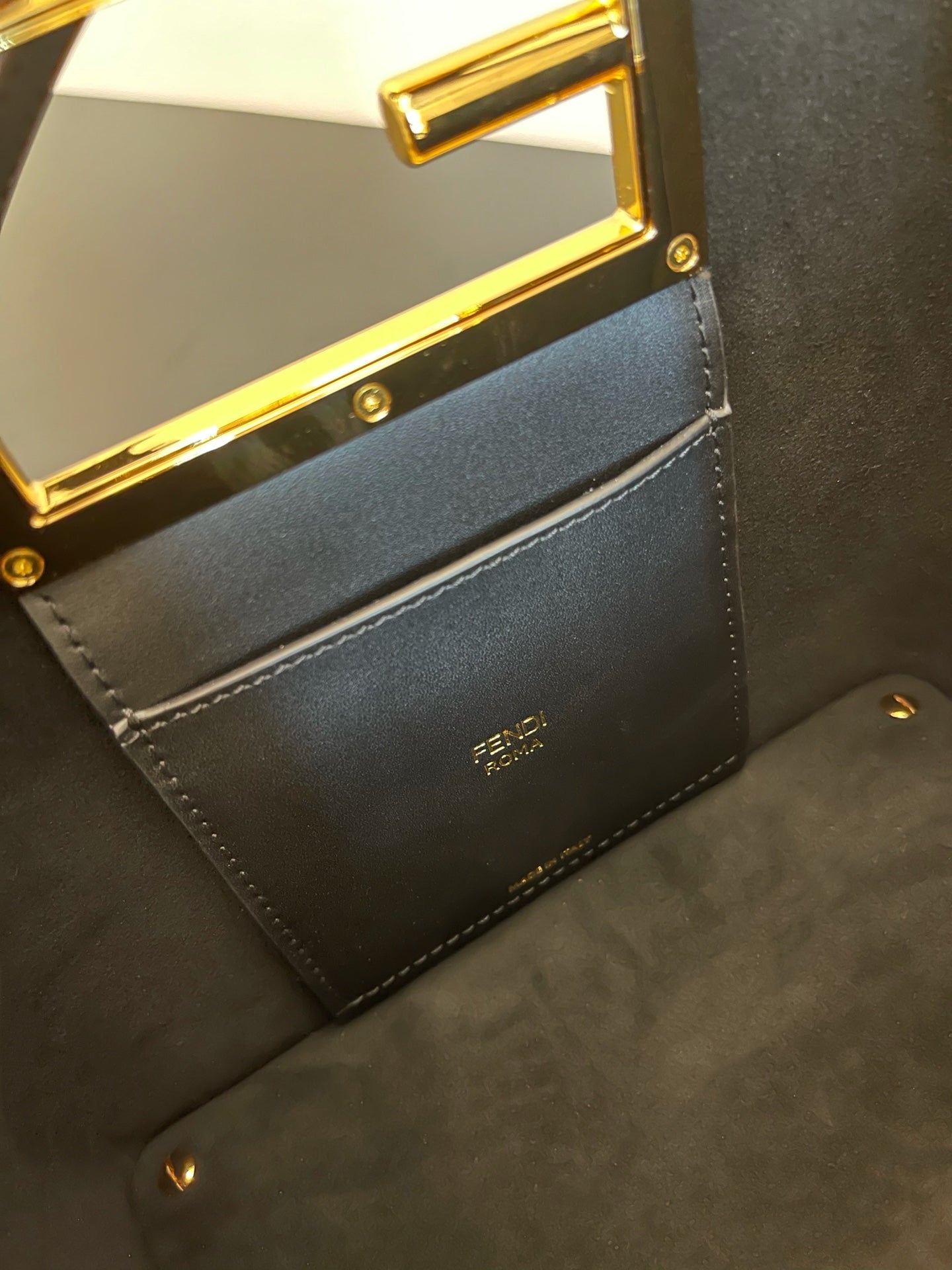 Luxury Black Leather Mini Bucket Shoulder Bag with Gold Metal Logo Buckle