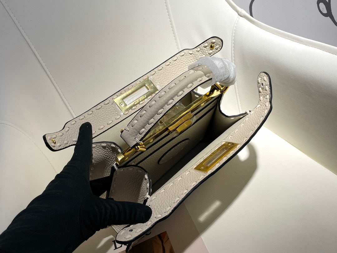 Elegant White Leather Top Handle Crossbody Bag with Gold-Tone Hardware